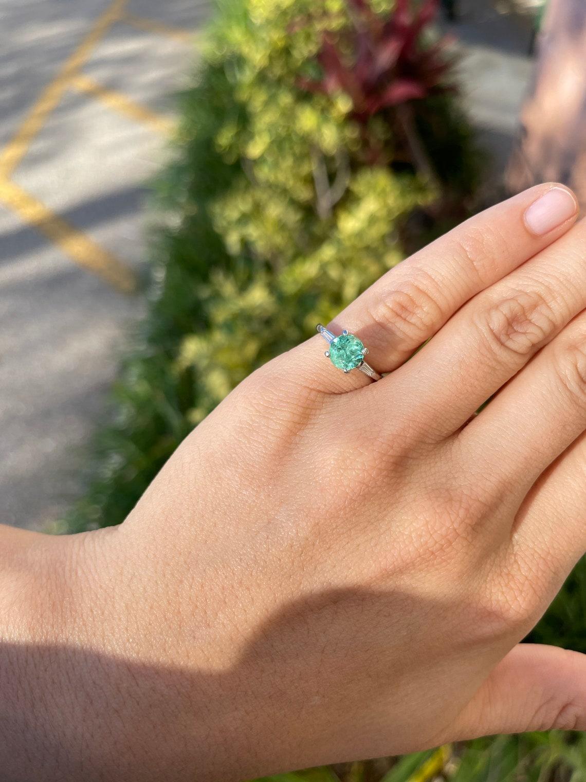 Modern 1.70tcw Plat Round Emerald & Diamond Three Stone Engagement Ring For Sale