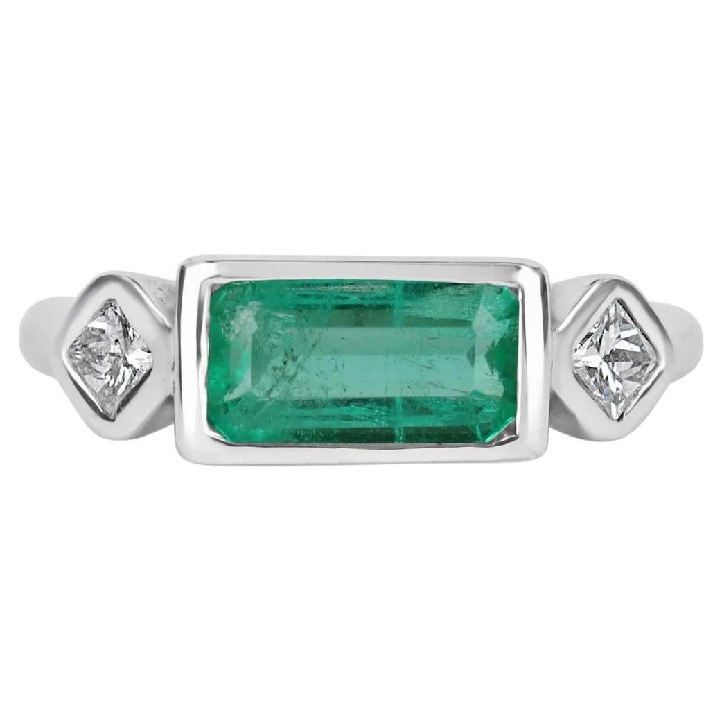 1.70tw 18K Three Stone Colombian Emerald Cut & Princess Cut Diamond Bezel Ring For Sale