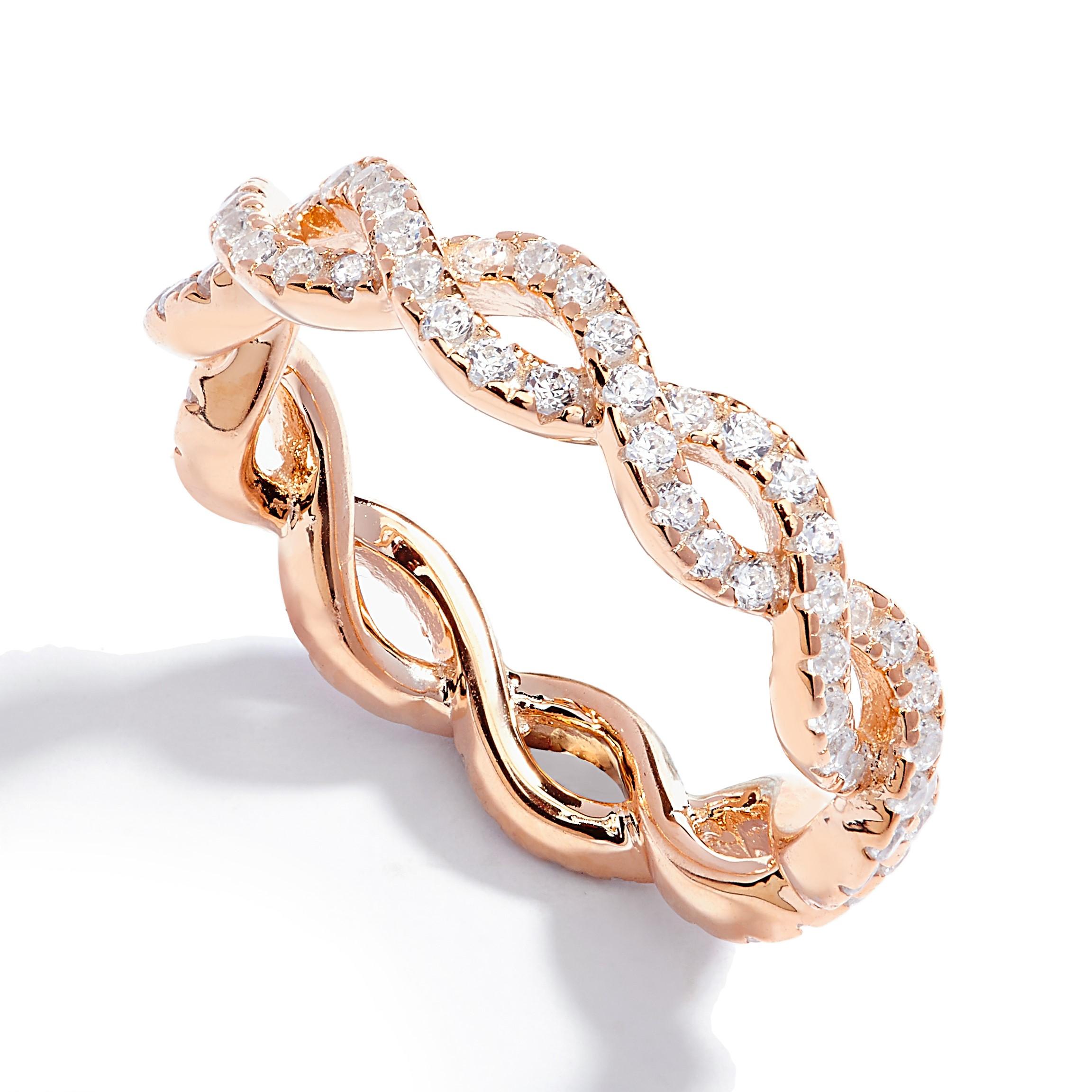 A classic look with a contemporary twist, this alluring full eternity twist ring effortlessly captures the most elegant of designs. Wear on it's own or together on the same finger for an on-trend stacked look.

Featuring 1.71ct of round brilliant