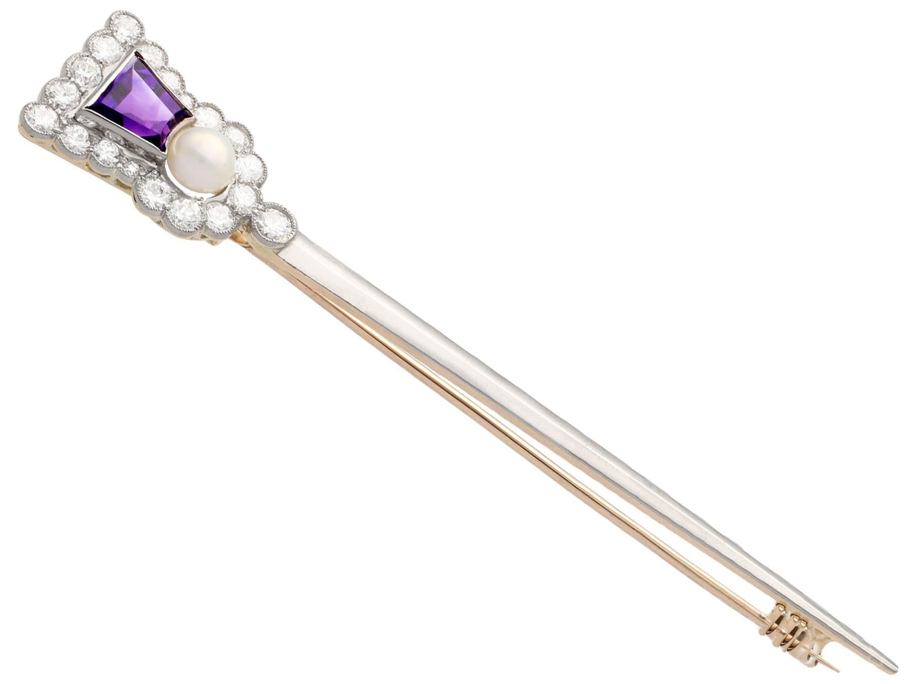A stunning, fine and impressive 1.71 carat amethyst, 1.90 carat diamond and pearl, 18 karat yellow gold pin brooch in the form of an thistle; part of our diverse antique jewelry and estate jewelry collections.

This stunning, fine and impressive