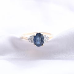 1.71 Carat Blue Sapphire 0.08 Carat SI/H Diamond Ring 14 Karat Yellow Gold