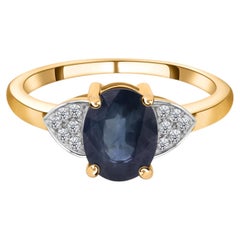 1.71 Carat Blue Sapphire 0.08 Carat SI/H Diamond Ring 14 Karat Yellow Gold