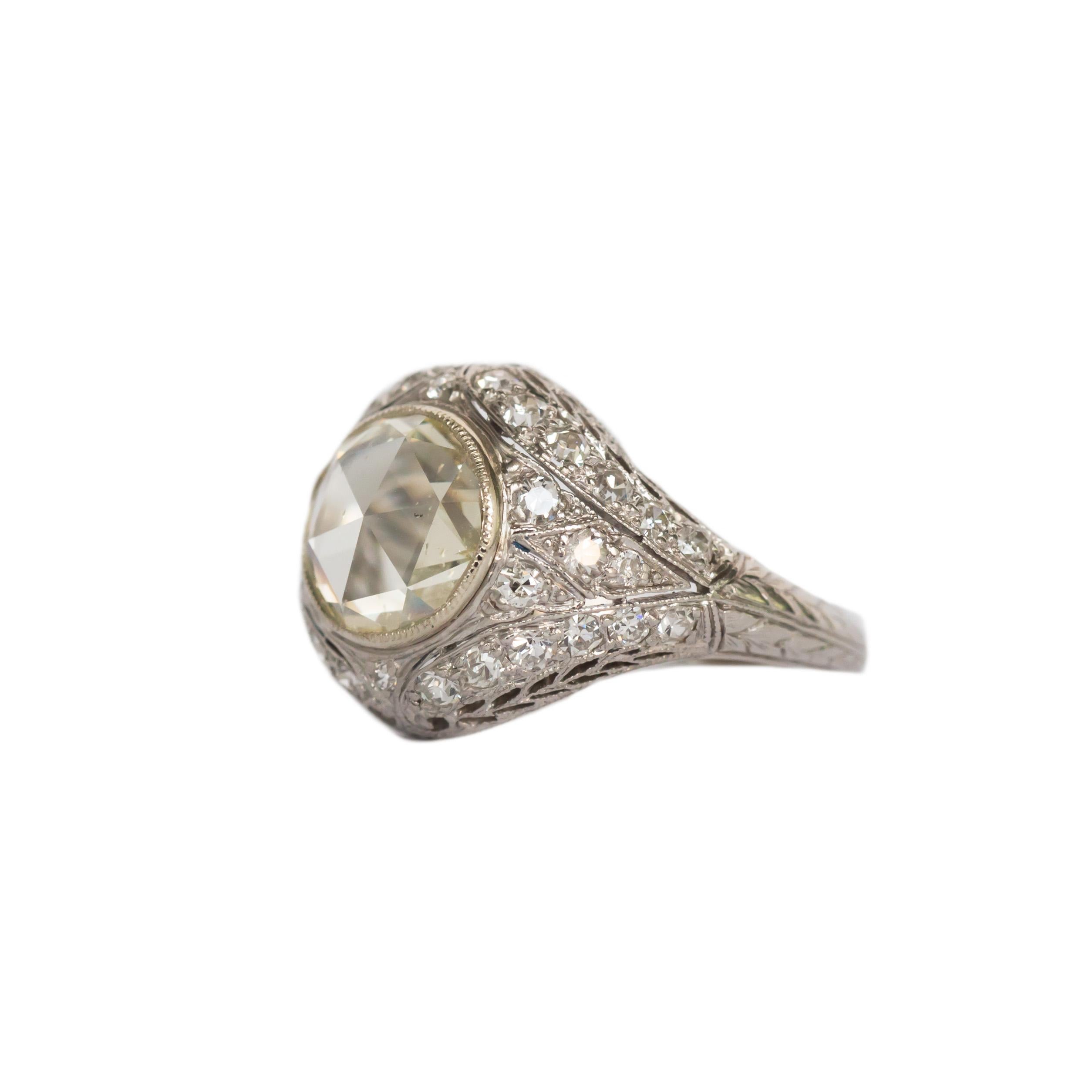 Ring Size: 4.90
Metal Type: Platinum
Weight: 4.7 grams

Center Diamond Details
Shape: Rose Cut 
Carat Weight: 1.71 carat
Color: L
Clarity: SI1

Side Stone Details: 
Shape: Antique European Cut 
Total Carat Weight: .25 carat, total weight
Color: