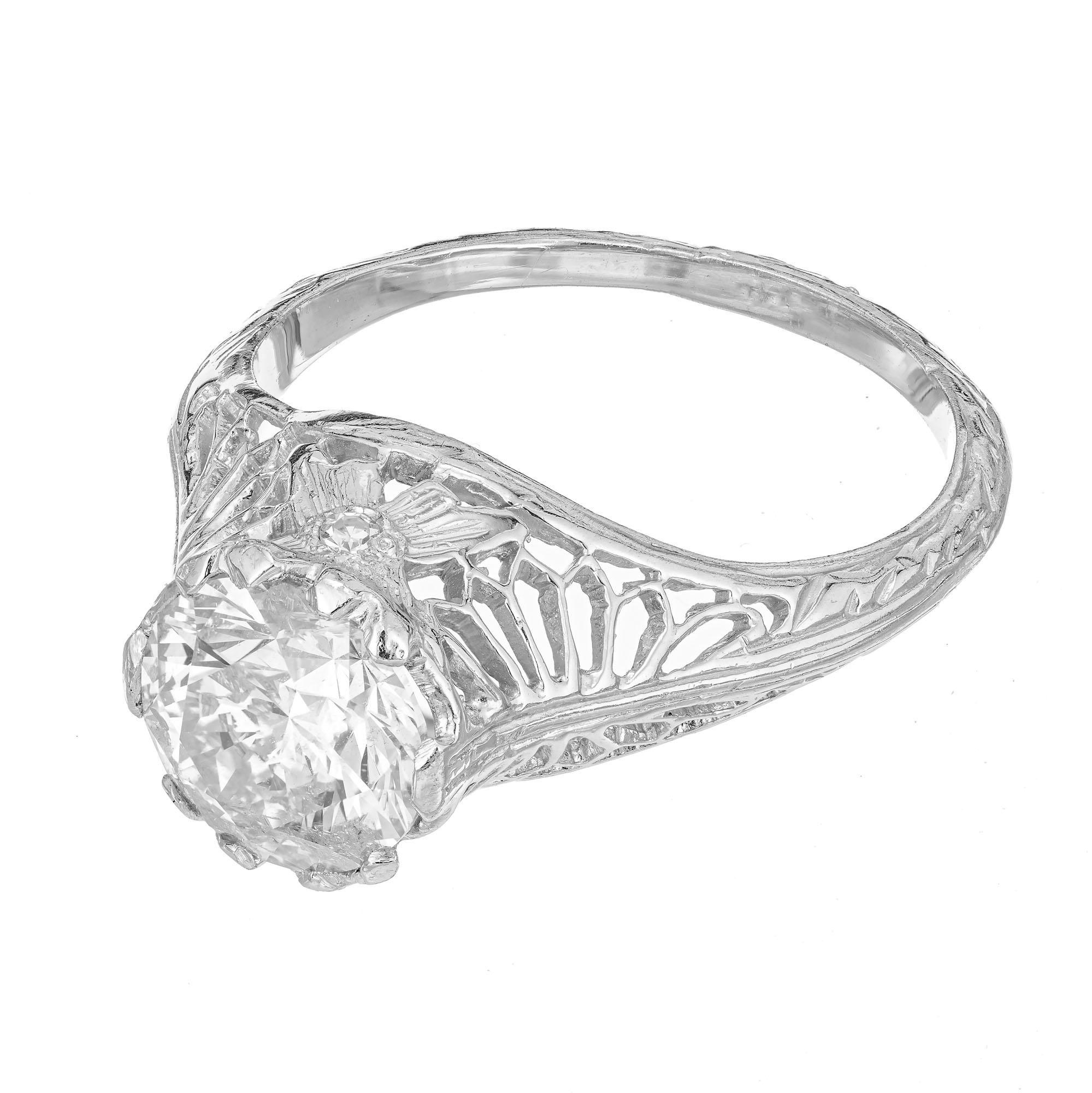 1940's transitional cut diamond engagement ring. Hand made platinum filigree, open scroll setting with and EGL certified 1.71ct center stone accented with 2 single cut diamonds. 

1 Ideal transitional cut brilliant diamond, approx. total weight