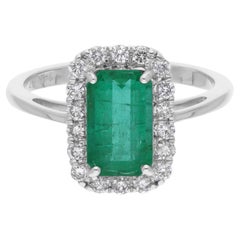 Anello con smeraldo dello Zambia da 1,71 carati e taglio smeraldo da 0,35 carati. Diamante SI/H Oro bianco 14 carati