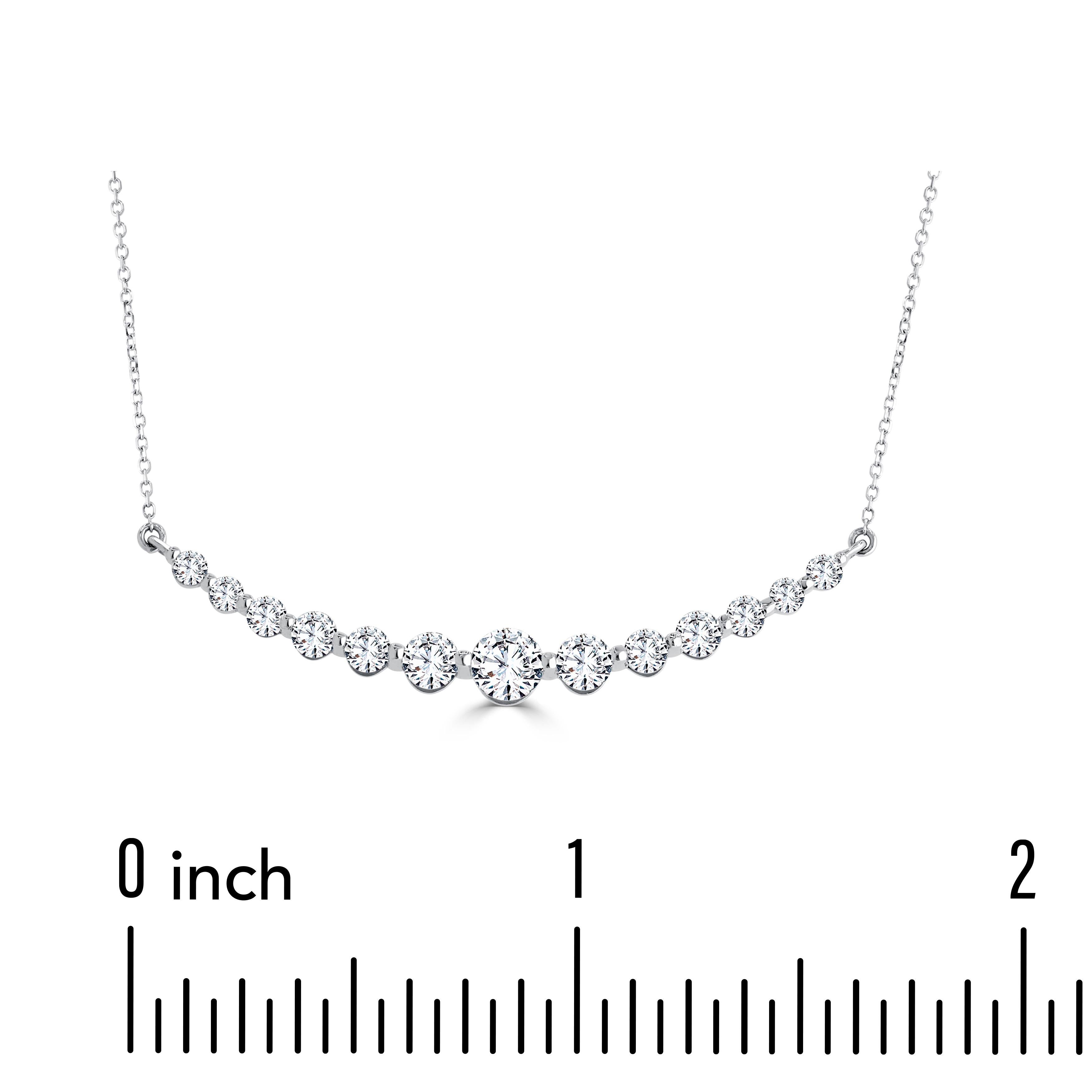 This necklace boasts fifteen brilliant, natural diamonds, each carefully selected for its exquisite quality. What sets this piece apart is the graduated arrangement of these diamonds, with varying sizes that create a captivating visual symphony. In