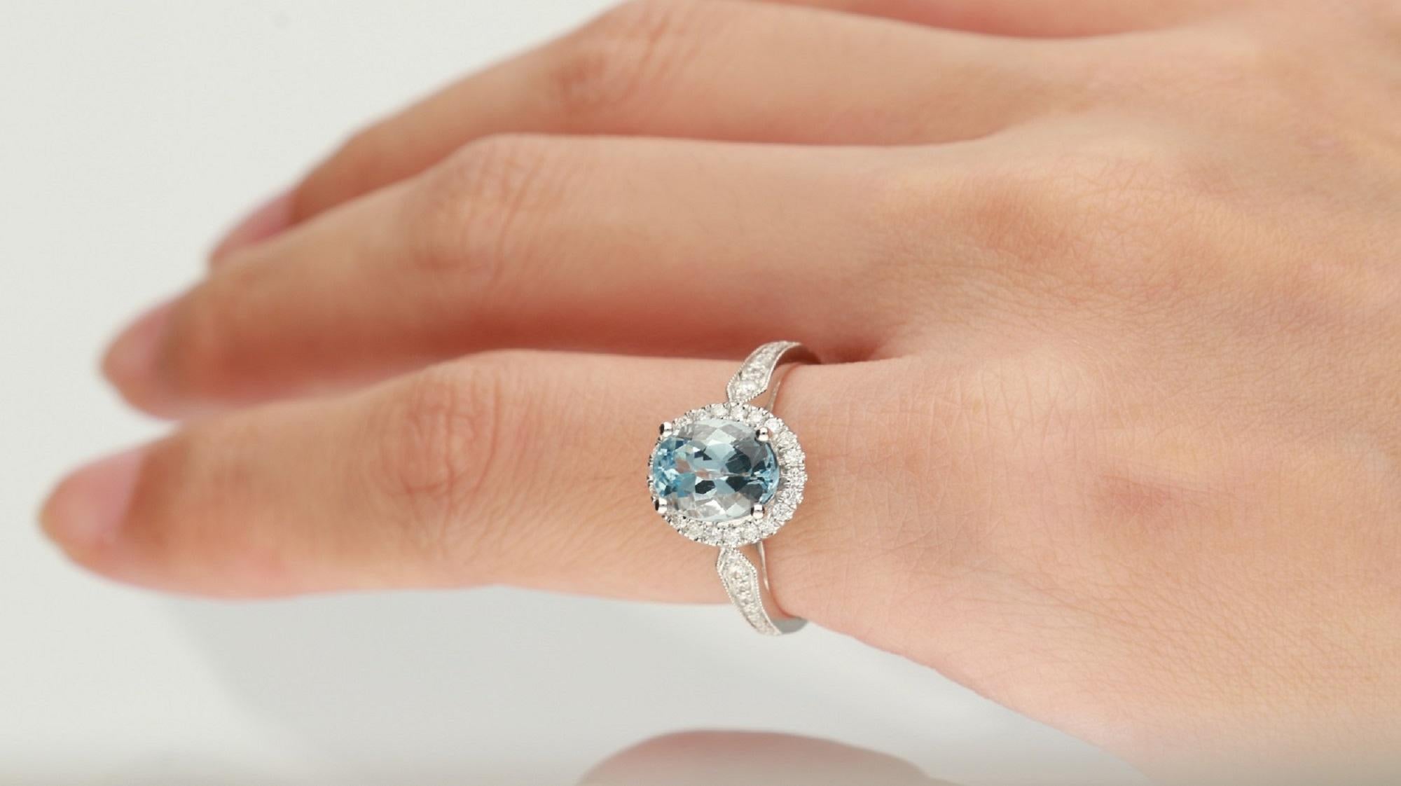 Stunning, timeless and classy eternity Unique Ring. Decorate yourself in luxury with this Gin & Grace Ring. The 14K White Gold jewelry boasts Oval-Shape Prong Setting Genuine Aquamarine (1 pc) 1.71 Carat along with Natural Round cut white Diamond
