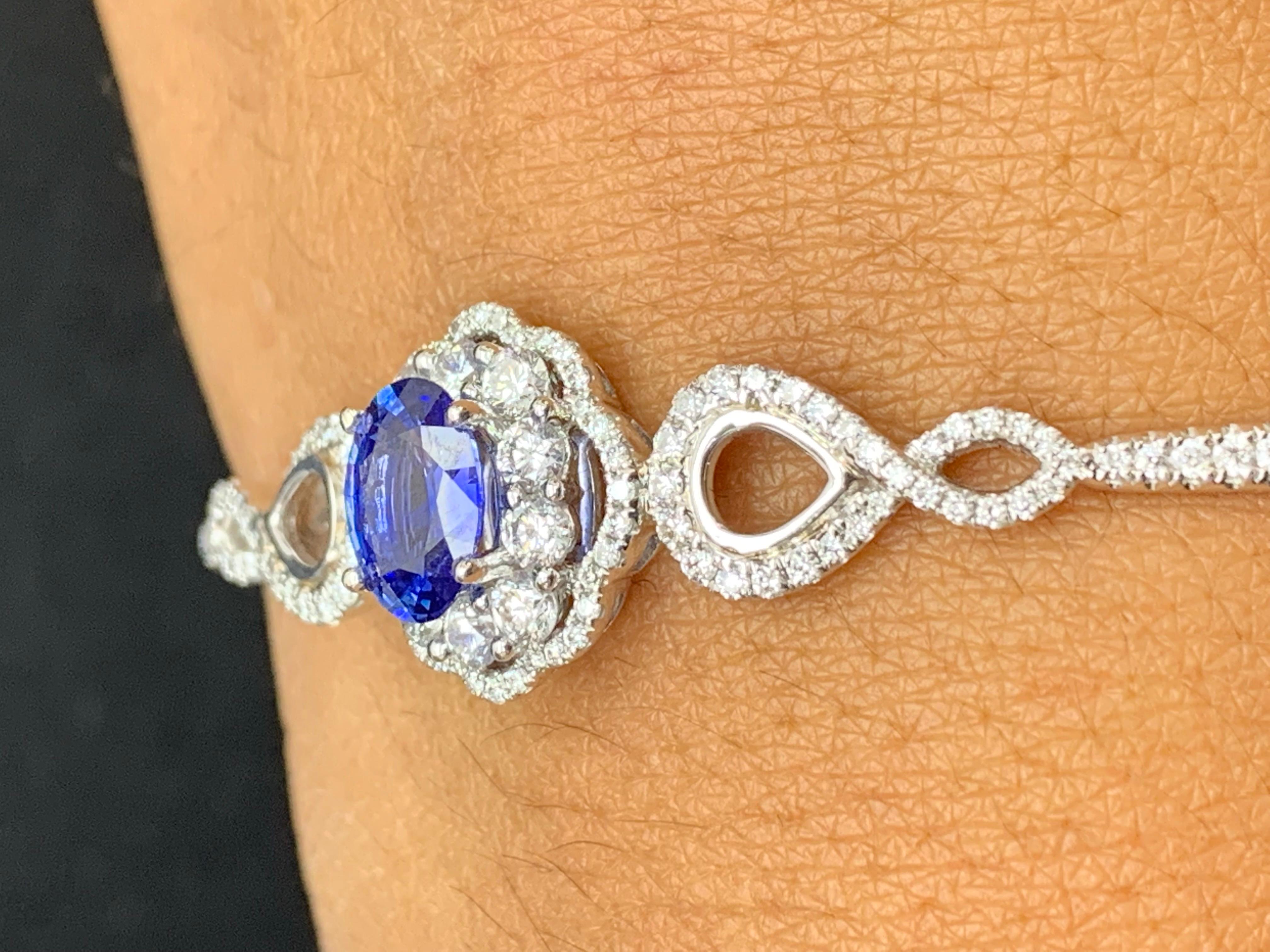 1.71 Carat Oval cut  Sapphire and Diamond Bangle Bracelet in 18K White Gold In New Condition For Sale In NEW YORK, NY