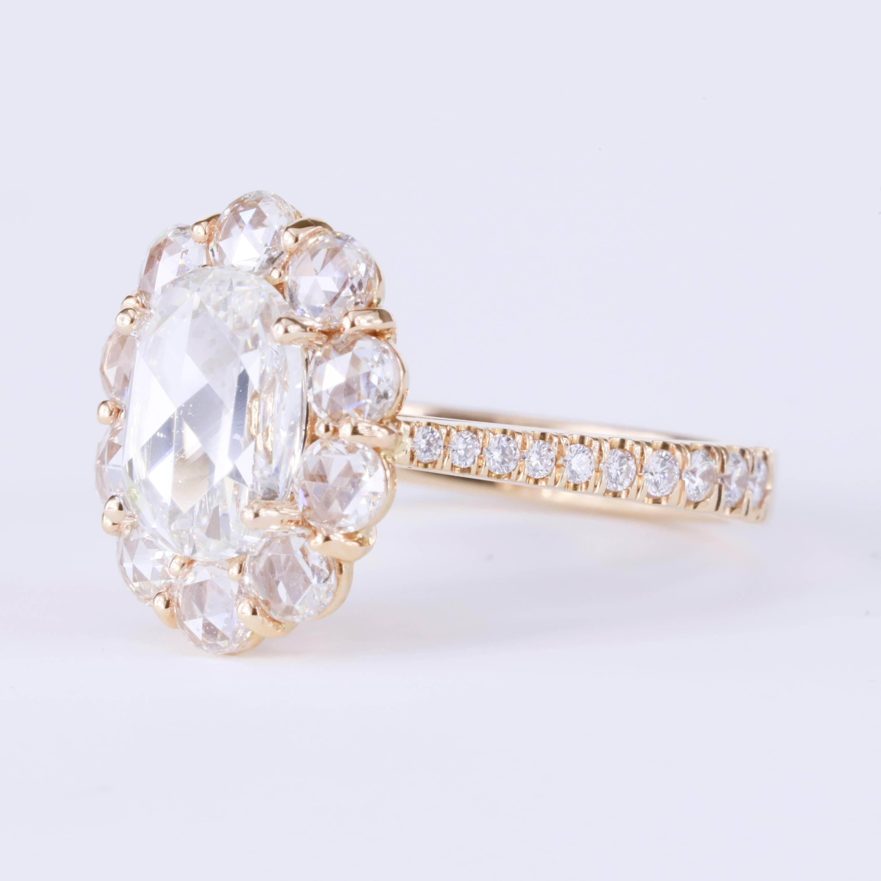 18k rose gold engagement or right hand ring
1.71 ct Oval Rose Cut Diamond center
0.79 tw (10 stones) round rose cuts surrounding the center diamond
0.27 tw round melee diamonds (20 stones) on shank
Size 6.5
*Very bright and sparkly diamond ring.