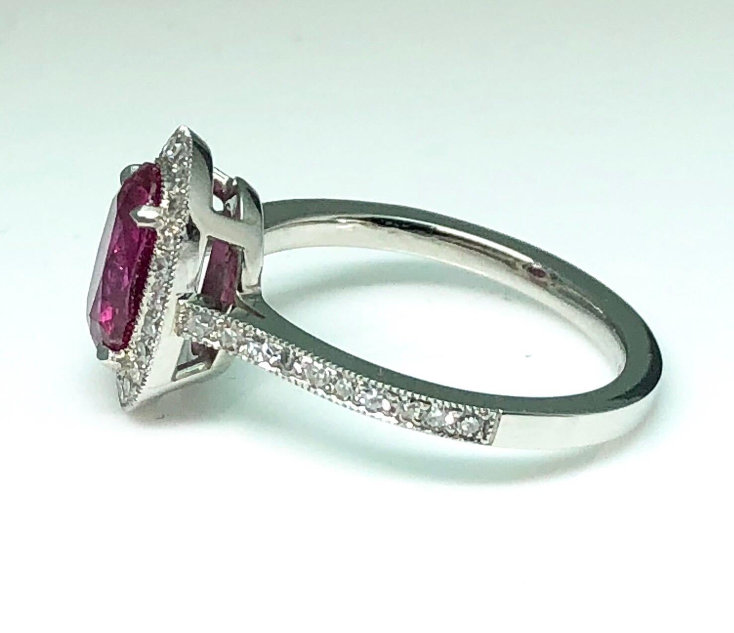 Oval Cut 1.71 Carat Ruby and Diamond Cluster Platinum Ring