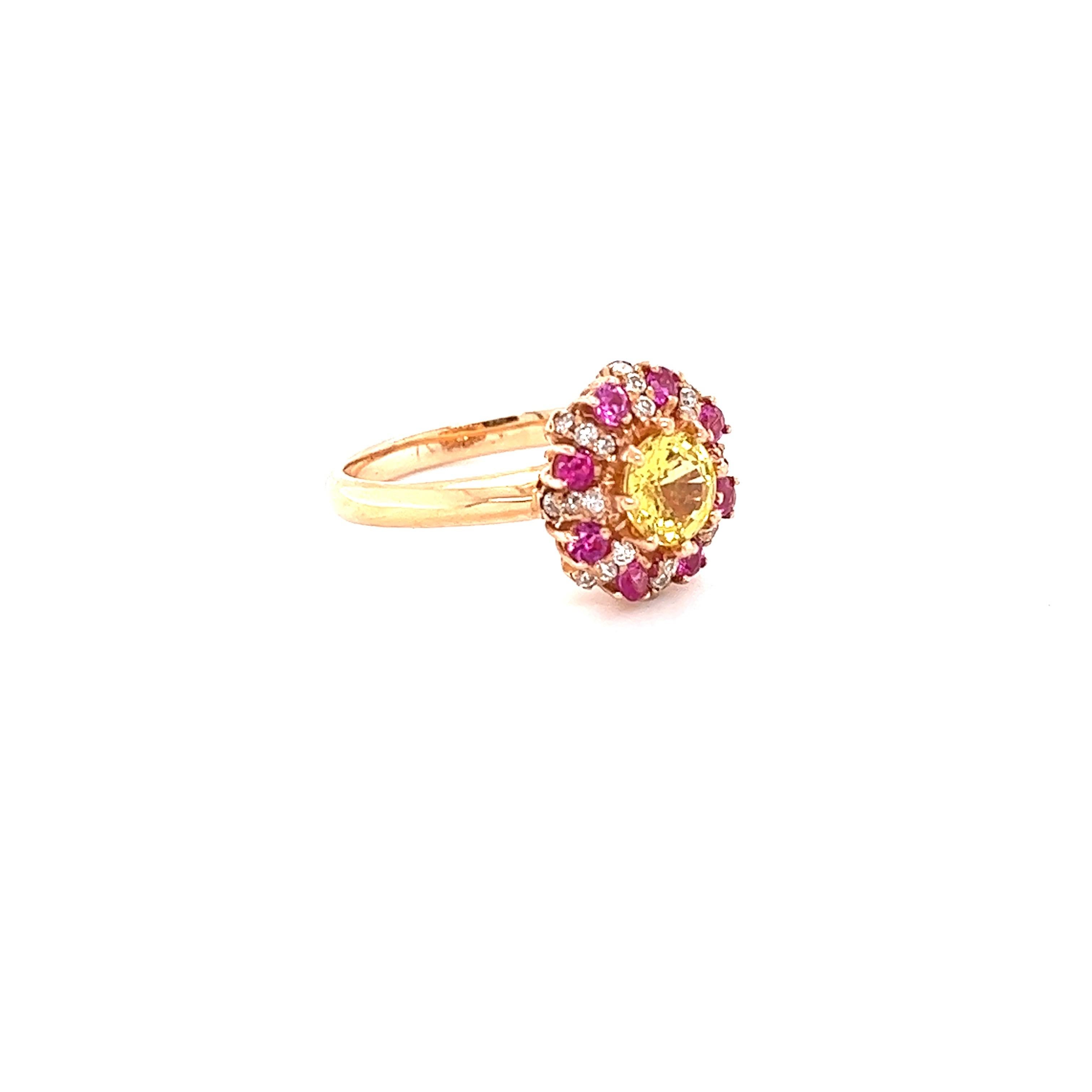This beautiful ring has a Round Cut Yellow Sapphire that weighs 1.09 carats and measures at approximately 6 mm. The Yellow Sapphire is heated as per industry standards.

It is surrounded by 8 Pink Sapphires that weigh 0.40 Carats and also has 24