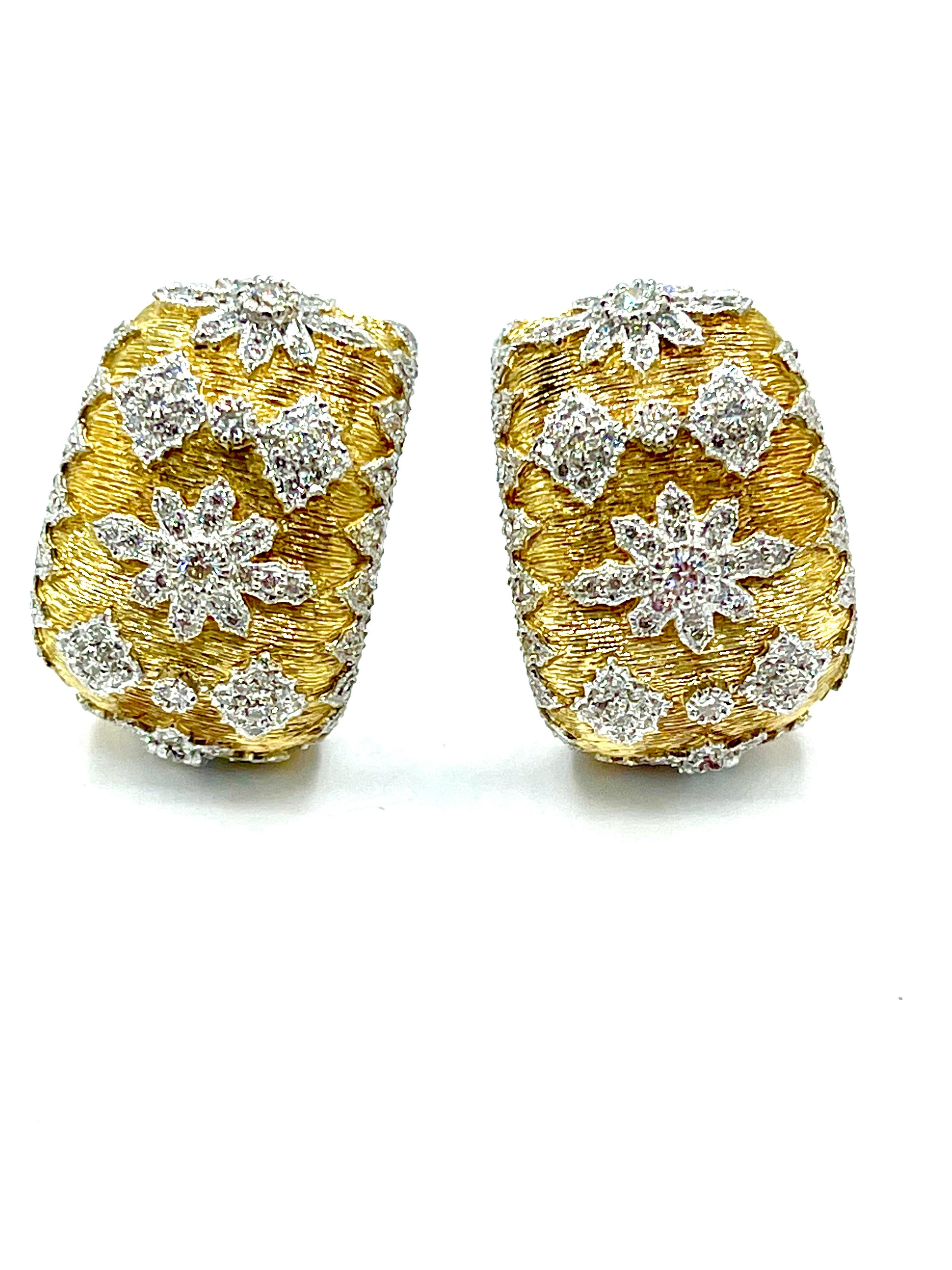 A pair of beautifully hand crafted diamond clip earrings.  The earrings contain 228 round brilliant Diamonds with a total weight of 1.71 carats.  The Diamonds are all set in 18K white gold designs, over top of the textured 18K yellow gold.  The back