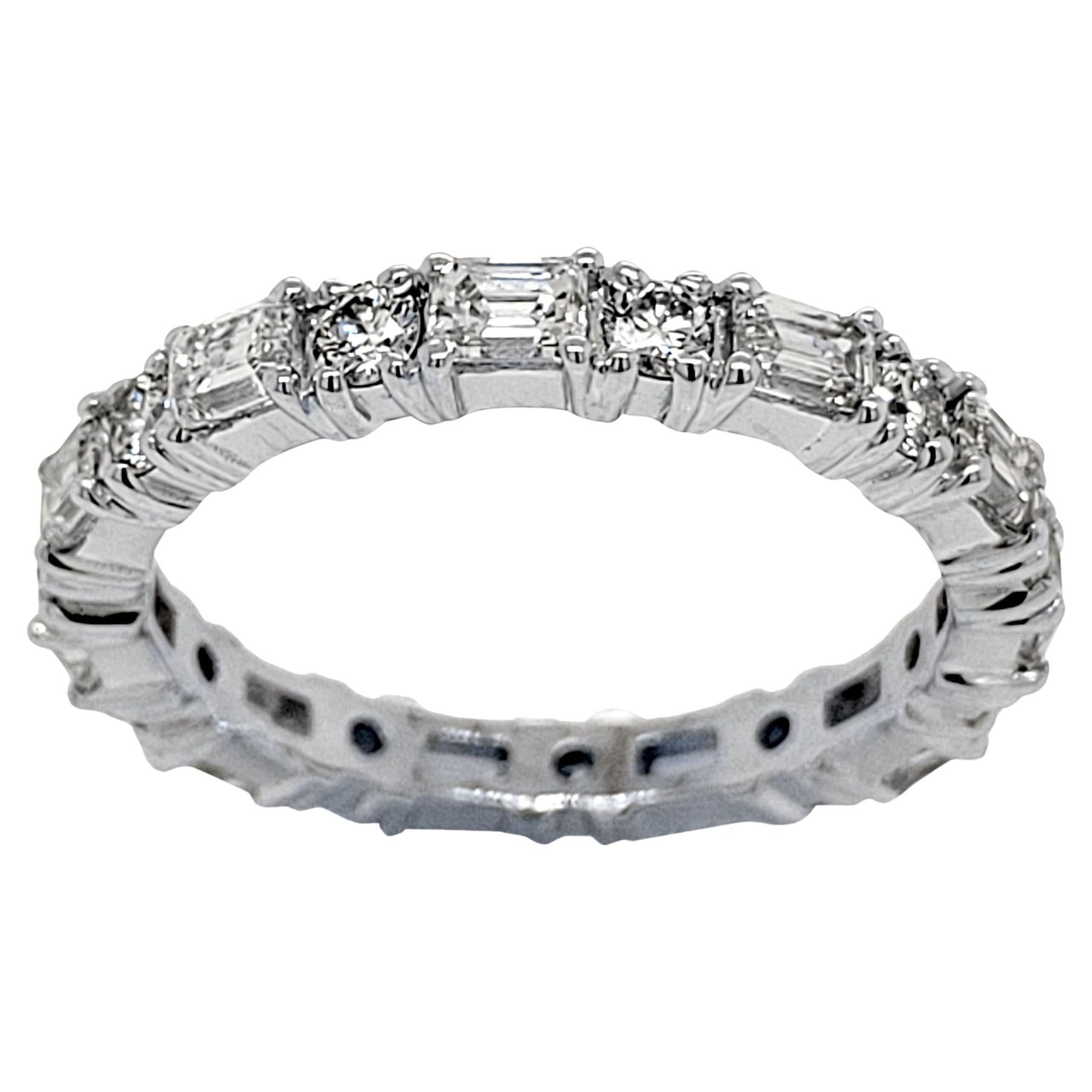 This beautiful Eternity Ring is made in 18K White Gold showcasing 11 perfectly matched VS/E-F Emerald Cut and 11 Round Brilliant Diamonds Set in Shared Prong Mode.
Total Weight of diamonds: 1.71 Ct Clarity: VS, Color: E-F
Total Weight of the Ring: