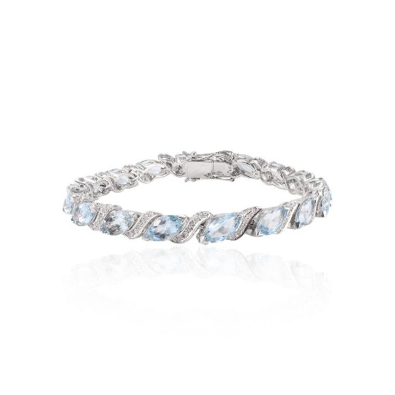 Beautifully handcrafted silver Aquamarine Diamond Tennis Bracelet, designed with love, including handpicked luxury gemstones for each designer piece. Grab the spotlight with this exquisitely crafted piece. Inlaid with natural aquamarine gemstones,