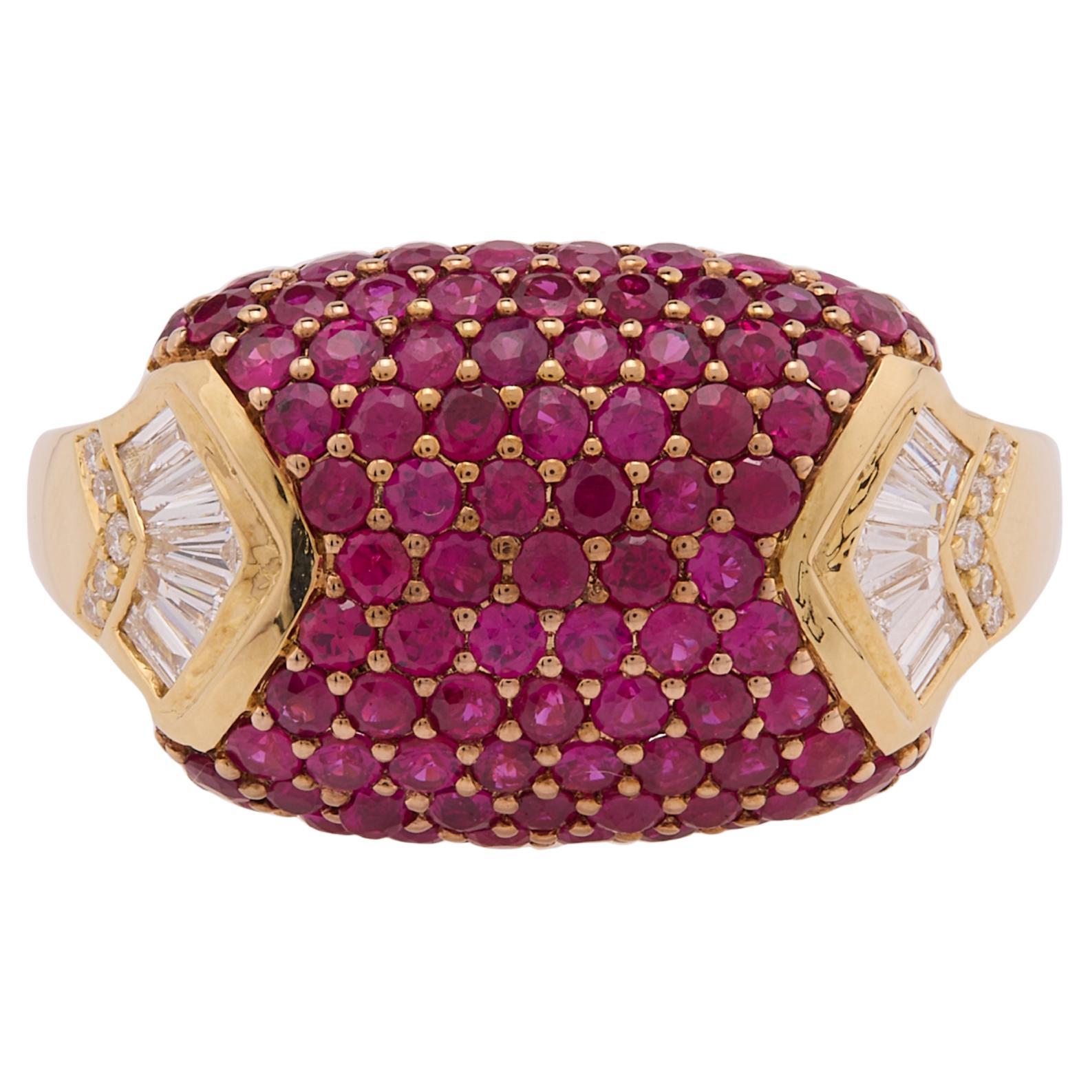 1.710 carats of round-cut rubies with Baguette and Diamond Ring in 18 Karat Gold