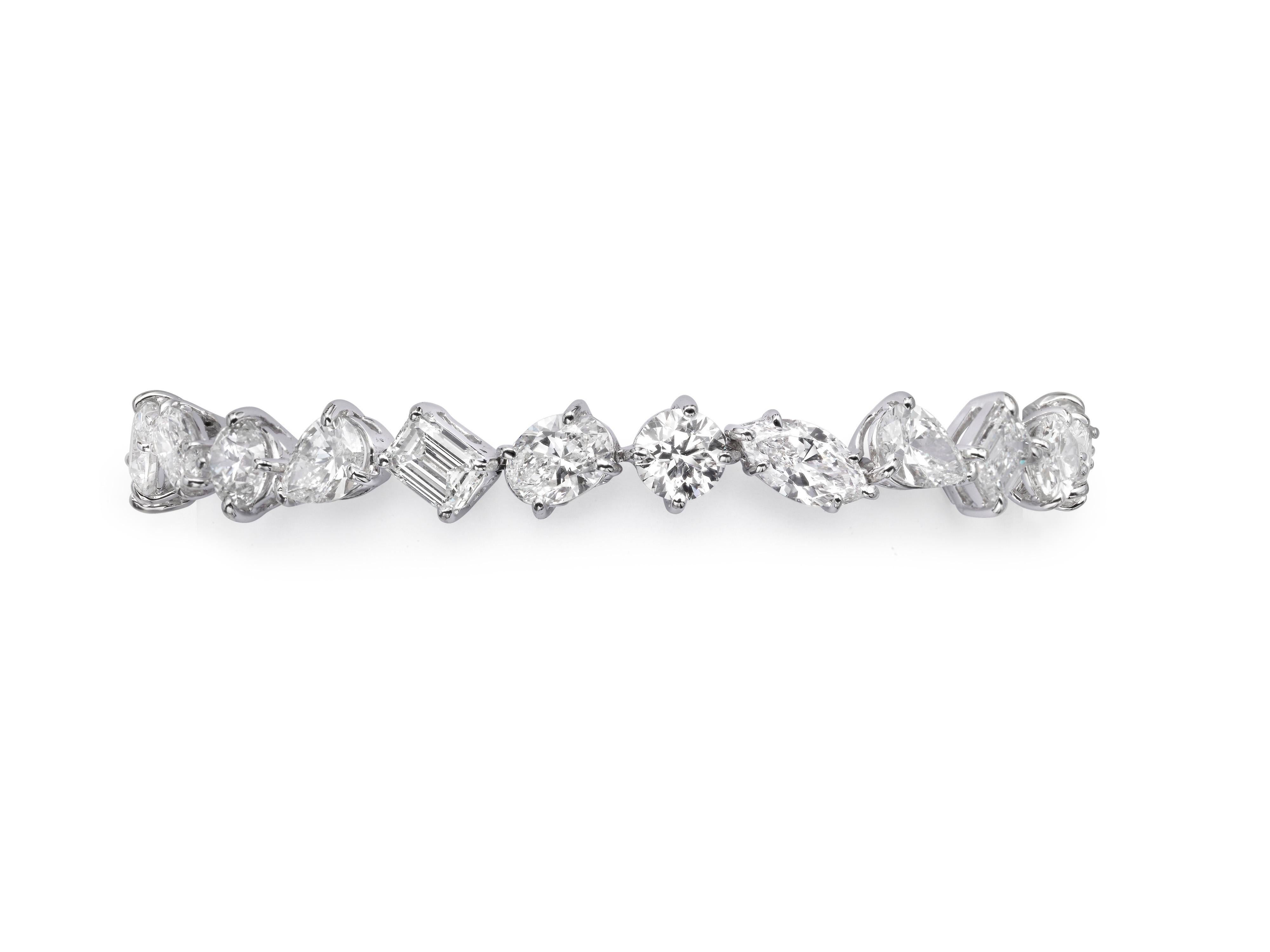 Butani's 17.16 carat multi shape diamond tennis bracelet features 24 fancy cut diamonds including round brilliant, emerald, marquise, oval and pear.  Perfect as a bridal piece worn with an engagement ring or alone as a statement.  Each diamond is
