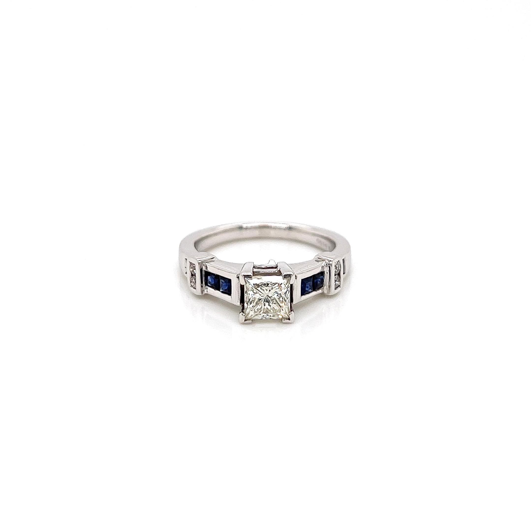 1.71 Total Carat Sapphire and Diamond Ladies Ring

-Metal Type: 14K White Gold
-1.05 Carat Princess Cut Diamond Center Stone, Clarity Enhanced
-0.56 Carat Princess Cut Blue Sapphire
-0.10 Carat Round Side Natural Diamonds
-Size 8.25

Made in New