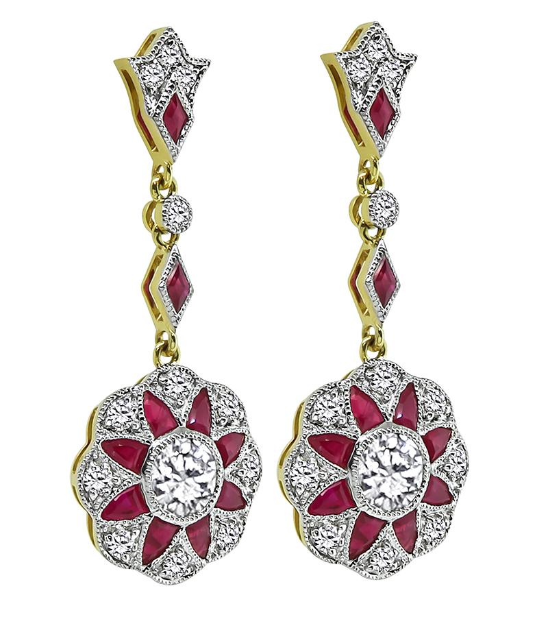 This is a charming pair of 14k yellow and white gold drop earrings. The earrings feature sparkling round cut diamonds that weigh approximately 1.71ct. The color of these diamonds is H-I with VS-SI1 clarity. The diamonds are accentuated by lovely