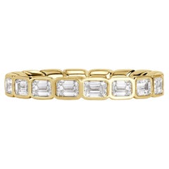 1.71ct Emerald Cut Diamond Bezel Set Eternity Band in 18K Yellow Gold