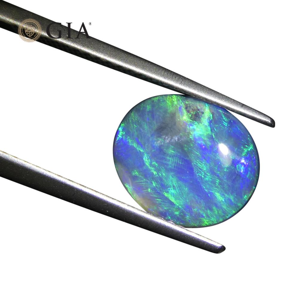 1.71ct Oval Cabochon Black Opal GIA Certified For Sale 3