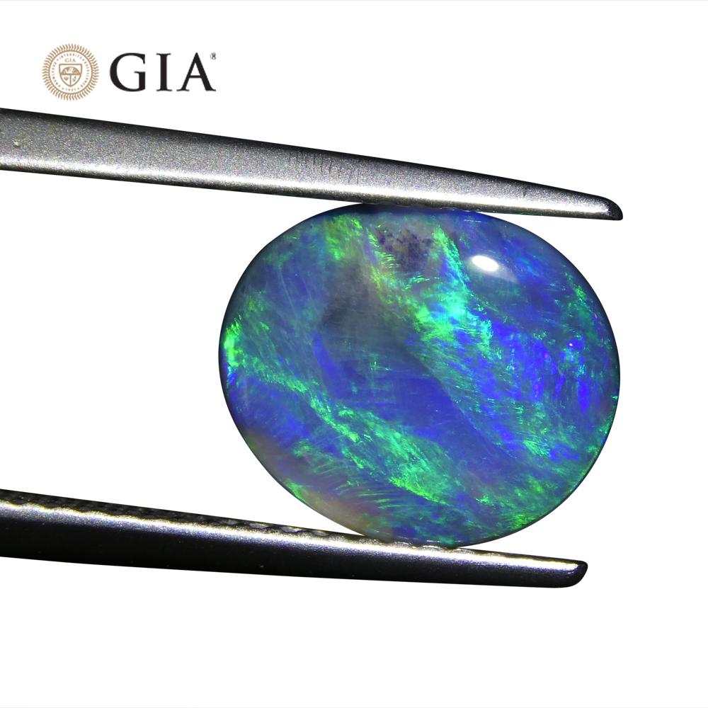 Oval Cut 1.71ct Oval Cabochon Black Opal GIA Certified For Sale