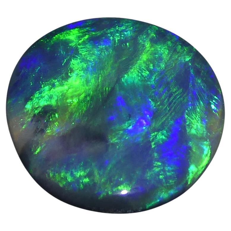 1.71ct Oval Cabochon Black Opal GIA Certified For Sale