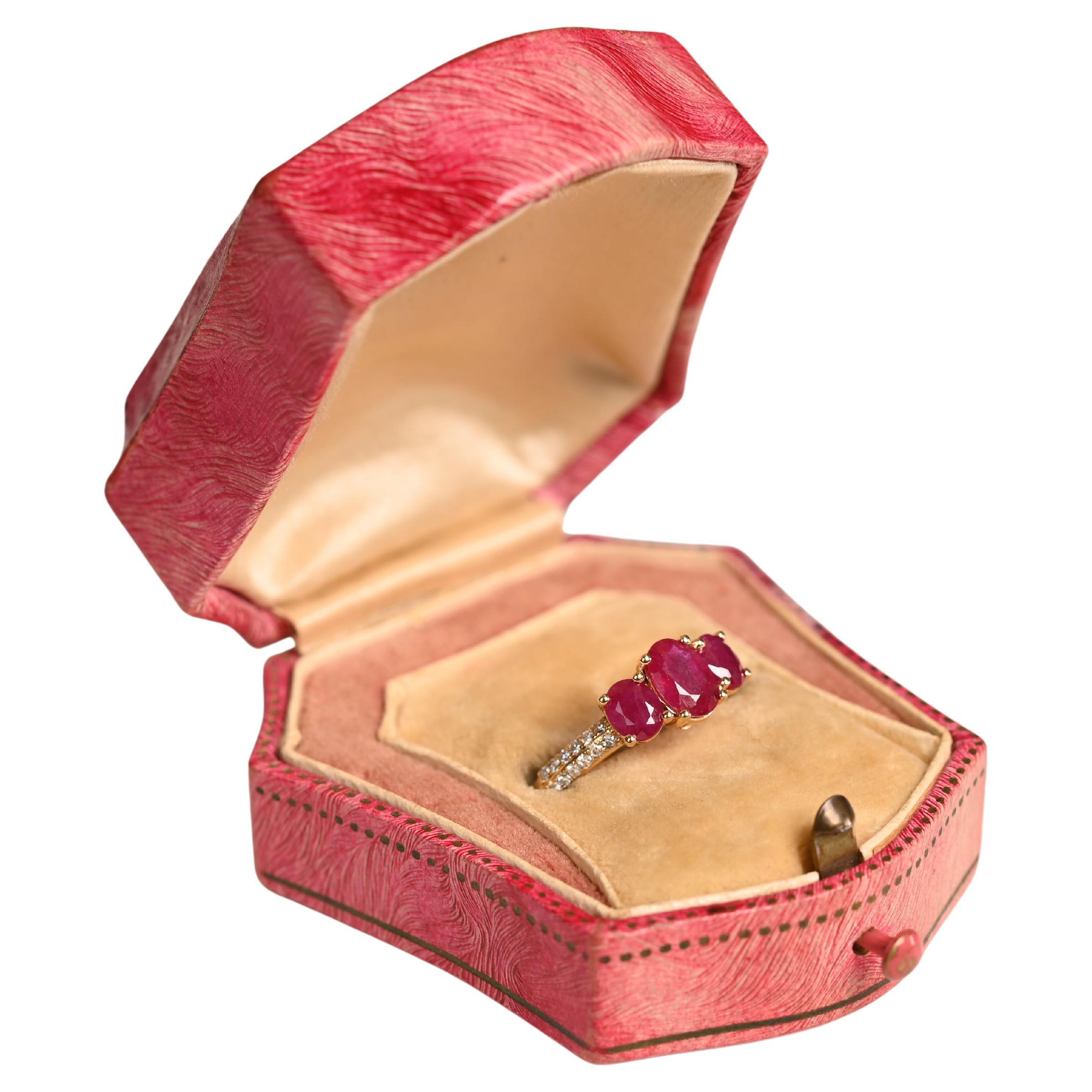 Oval Cut Three Stone Ruby Ring (Approx. 1.70-Carats), 18K Yellow Gold
