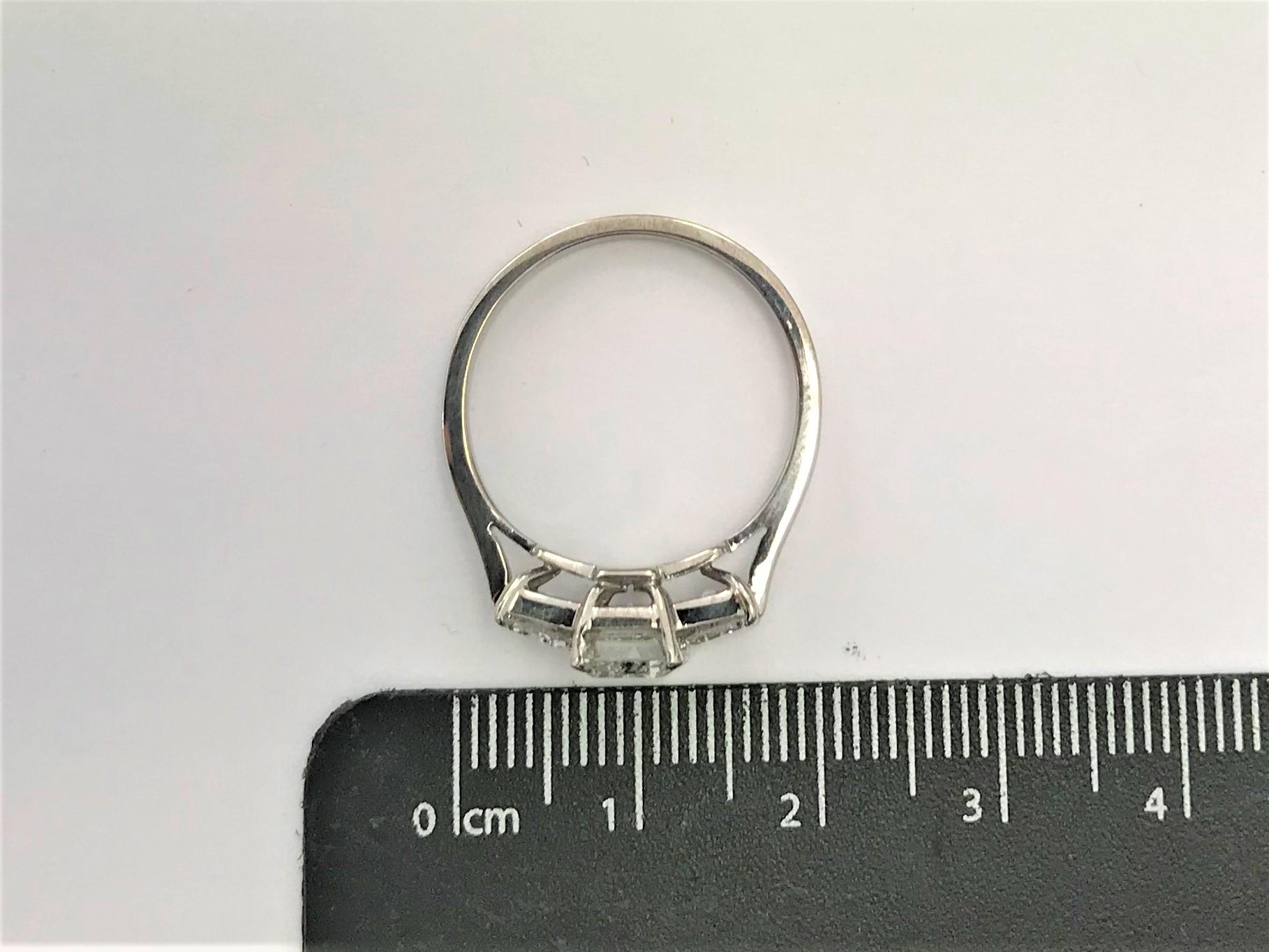 1.72 Carat Emerald Cut Diamond  18 Carat White Gold Three-Stone Ring 4