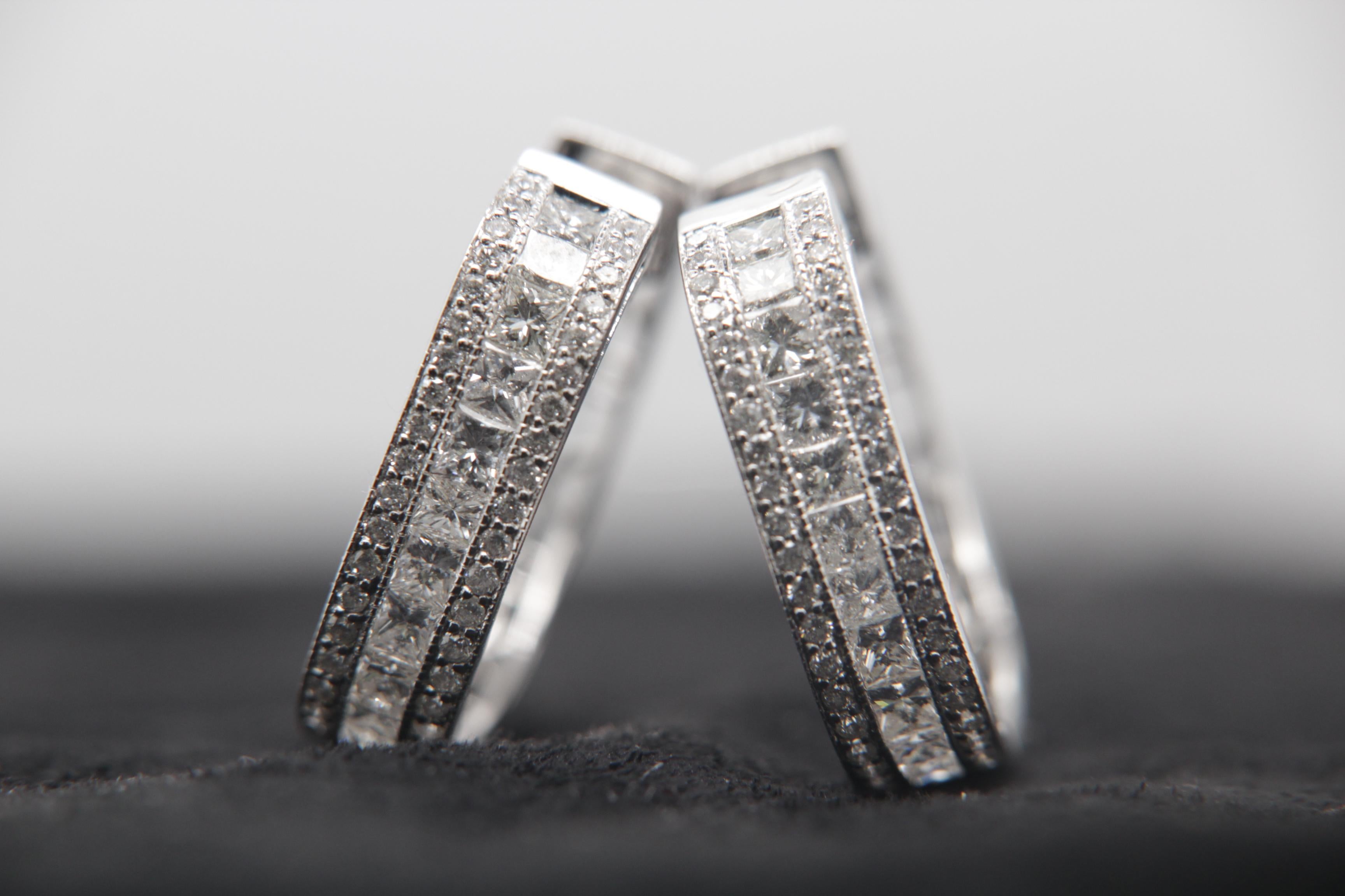 A brand new diamond earring in 18 karat gold. The total diamond weight is 1.72 carat and total earrings weight is 6.95 grams.
