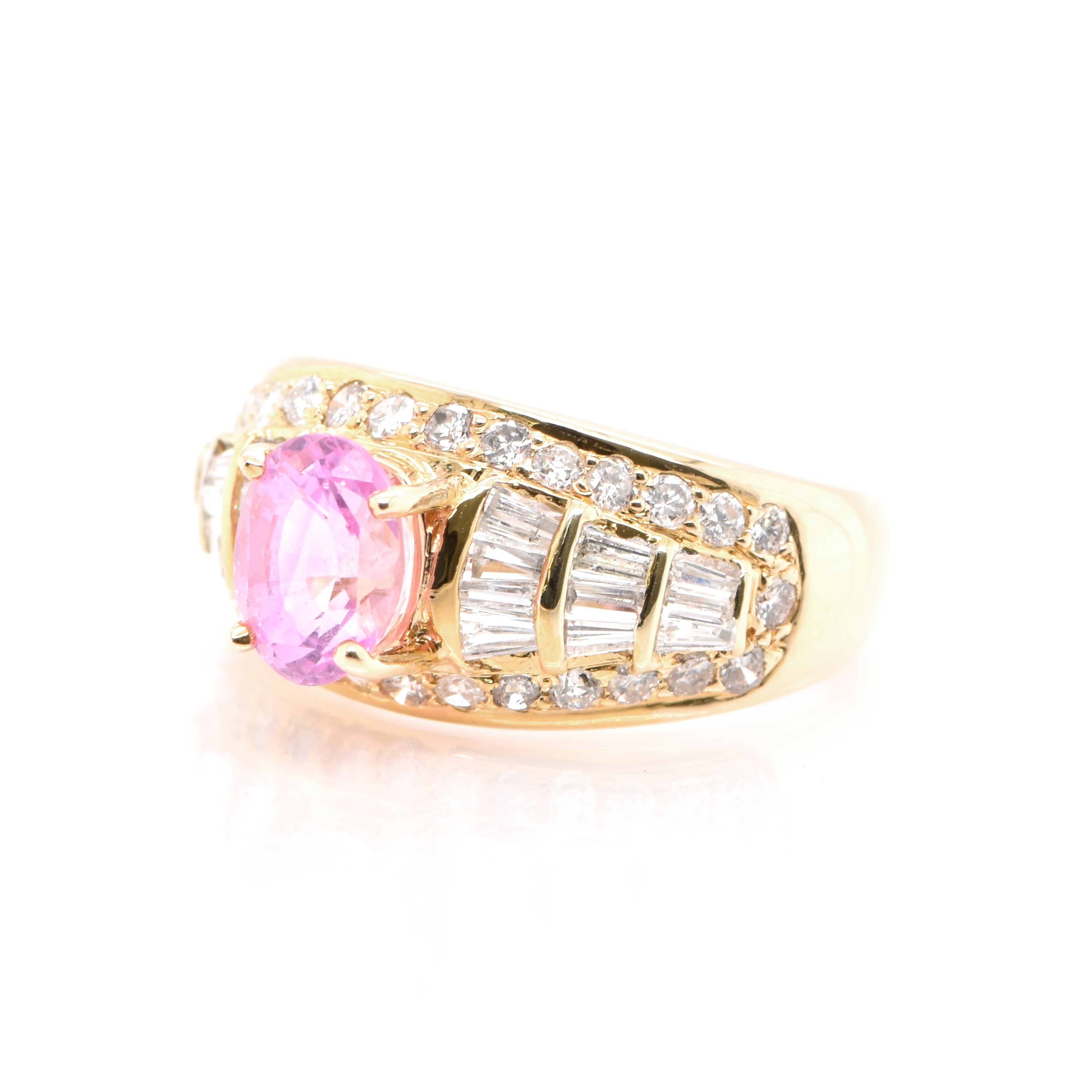 A beautiful Cocktail Ring featuring a 1.72 Carat Natural Pink Sapphire and 1.10 Carats of Diamond Accents set in 18 Karat Yellow Gold. Sapphires have extraordinary durability - they excel in hardness as well as toughness and durability making them