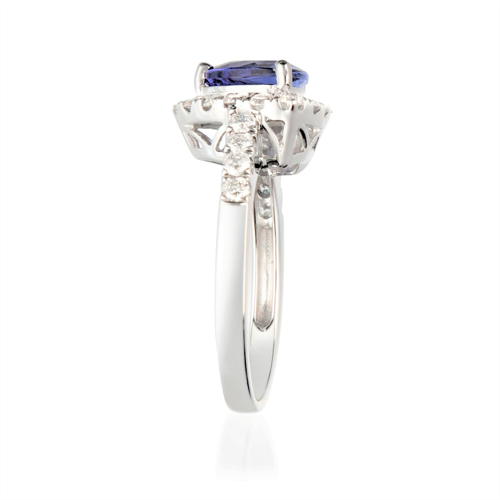 This beautiful Tanzanite Ring is crafted in 14-karat White gold and features a 1.72 carat trillion cut Genuine Tanzanite, 23 Pcs Round White Diamonds in GH- I1 quality with 0.70 ct. in a prong-setting. This Rings comes in in sizes 6 to 9, and it is