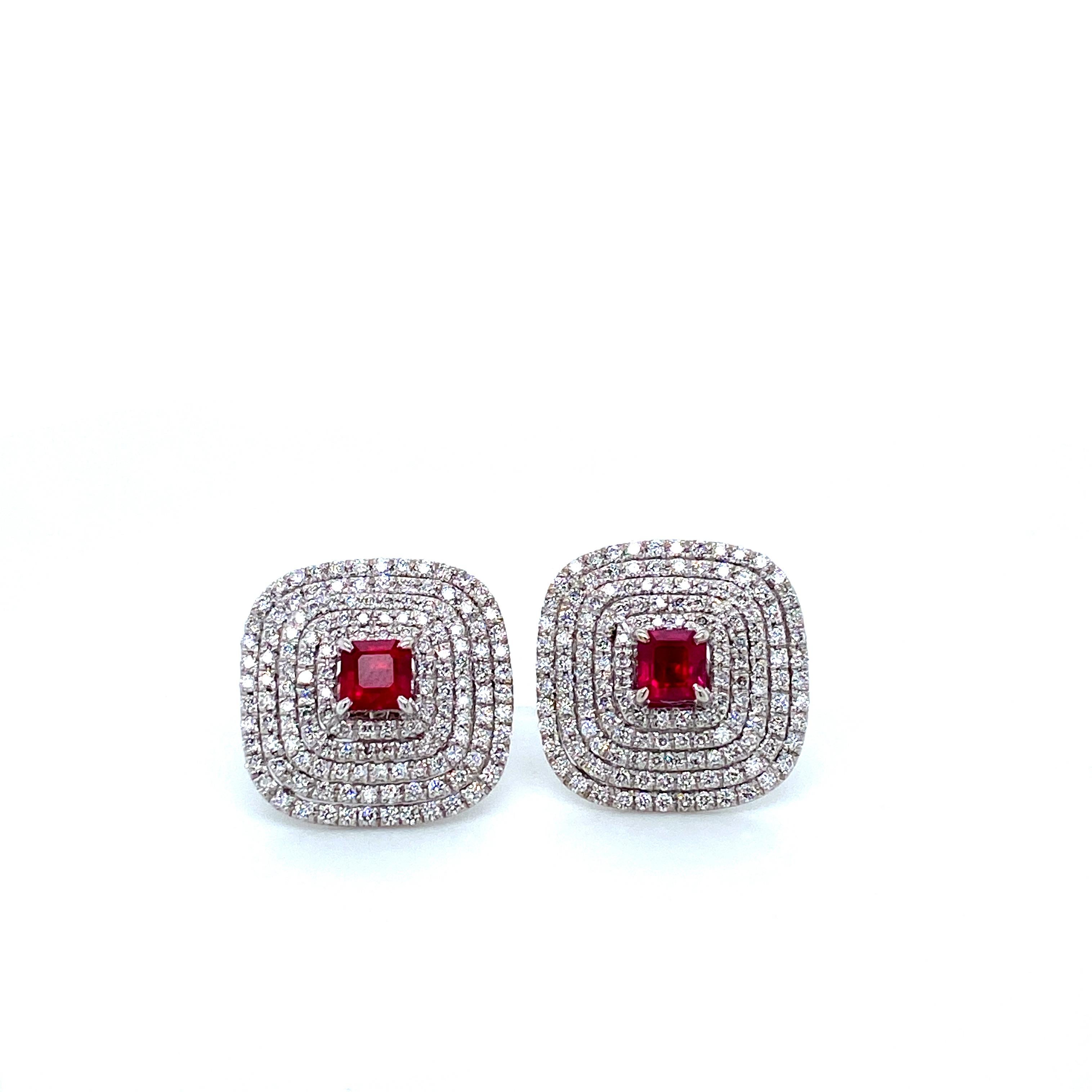 1.72 Carat Vivid Red Ruby And White Diamond Gold Earrings:

A simple and elegant pair of earrings, it features two square-cut vivid red rubies weighing 1.72 carat, surrounded by white diamonds weighing 1.7 carat. The rubies possess a rich vivid red