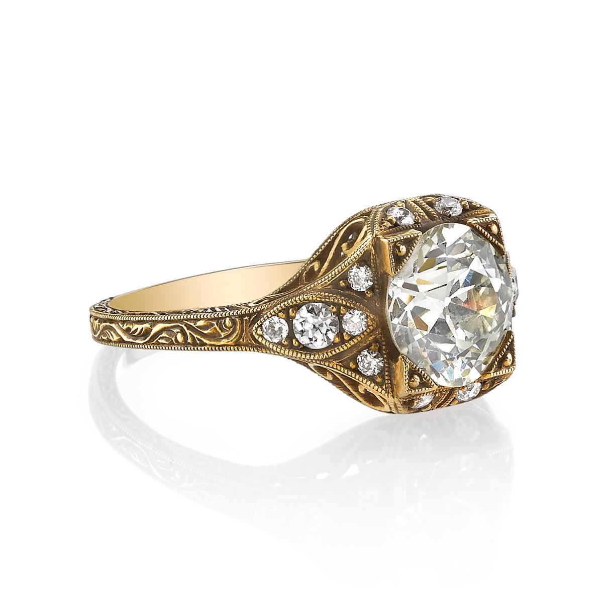 1.72ct MN/VS old European cut diamond with 0.19ctw diamond accents set in a handcrafted 18K oxidized yellow gold mounting. Ring is currently a size 6 and can be sized to fit.