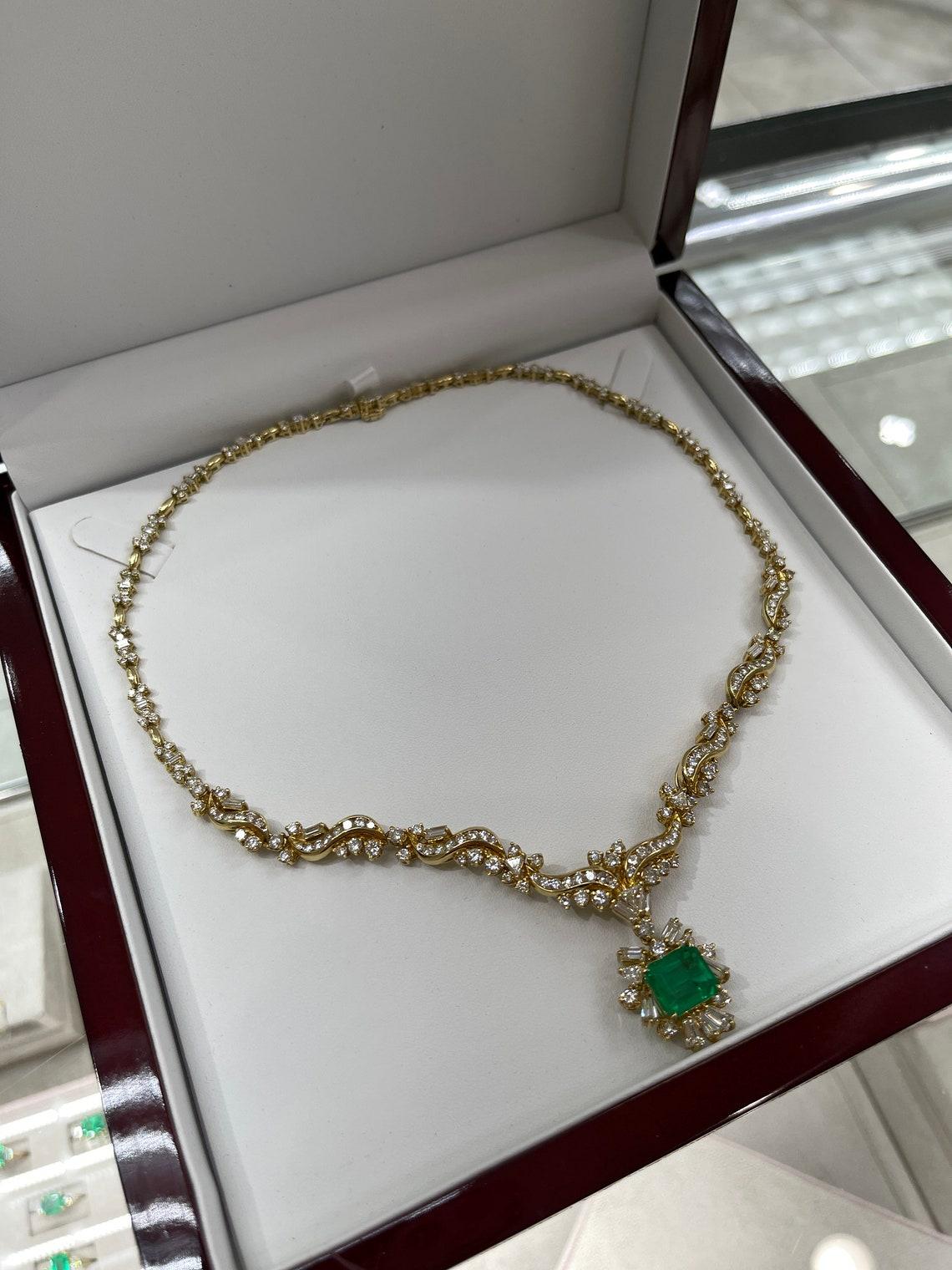 Emerald Cut 17.20 Carat Colombian Emerald Statement Necklace with Multi-Cut Diamonds For Sale