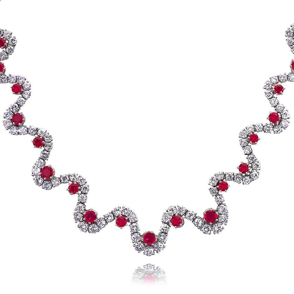 Modern 17.20 Carat Diamond and 4.25 Carat Ruby Wave Motif Platinum Necklace For Sale