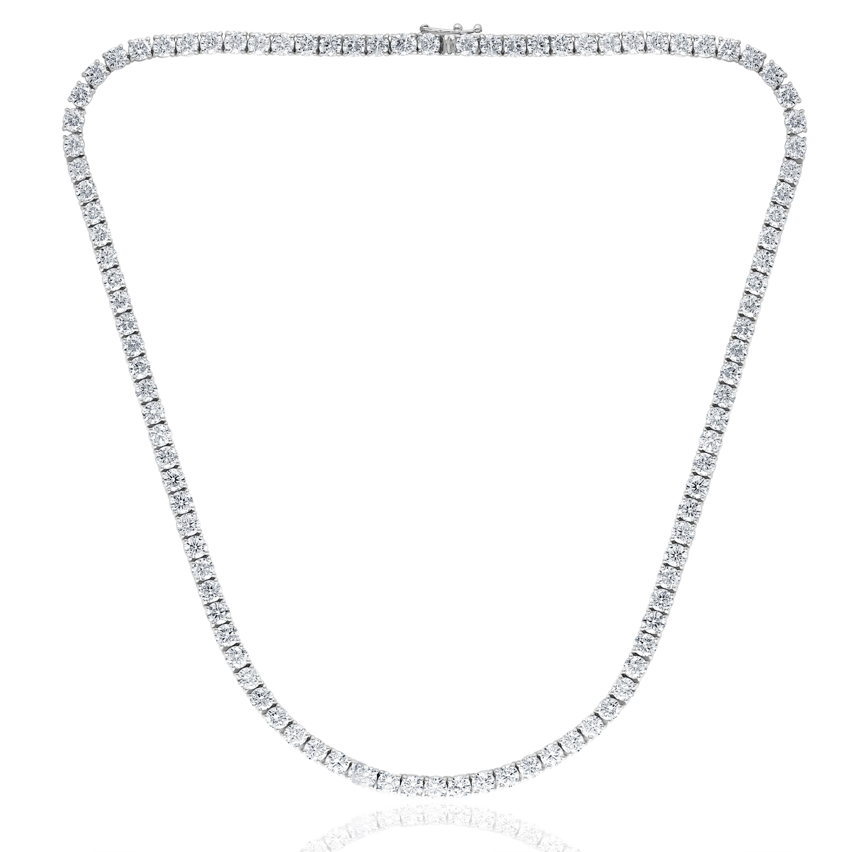A brilliant and classic piece showcasing a line of round diamonds set in 14K White Gold. 113 diamonds in this necklace are brilliant round cut and weigh 17.21 carats in total. 16 inches in length.