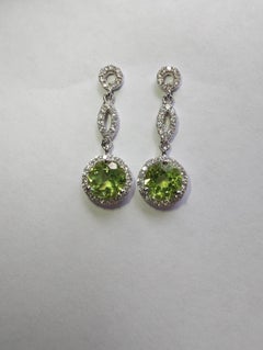 Boucles d'oreilles pendantes en diamant péridot 1,723ct
