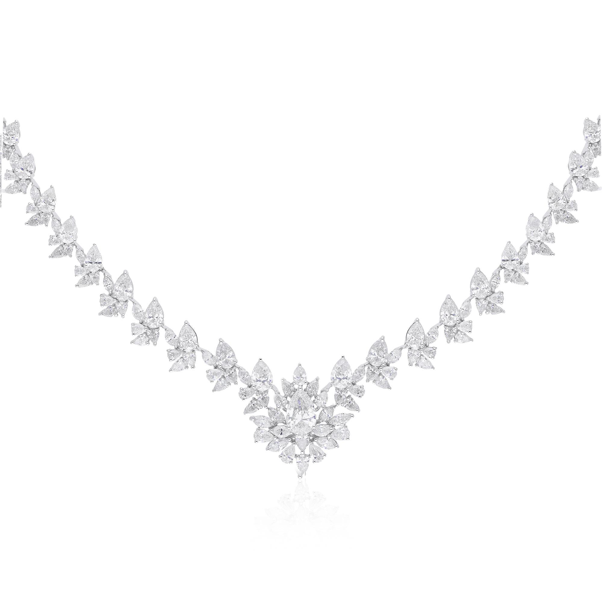 At the heart of this exquisite necklace lies a stunning 17.24 carat pear marquise-cut diamond, meticulously selected for its unparalleled brilliance and clarity. The pear marquise cut, renowned for its elongated shape and graceful curves, showcases