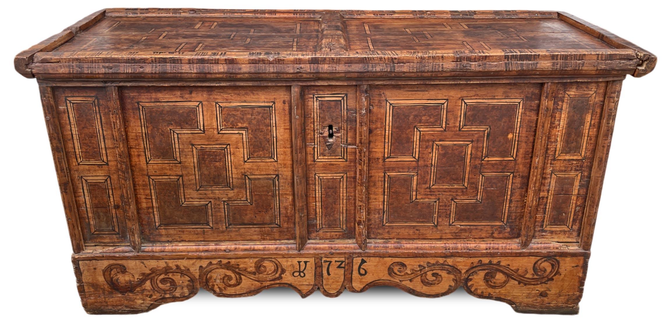 1726 Brown Painted Chest 
Dimensions: H. 81 cm - W. 160 cm - D. 62 cm
Period: 1726
Origin: Tyrol
Wood: Fir

Description:
Beautiful and large chest painted in Tyrolean style.
The decorations are geometric and monochromatic, typical of the first