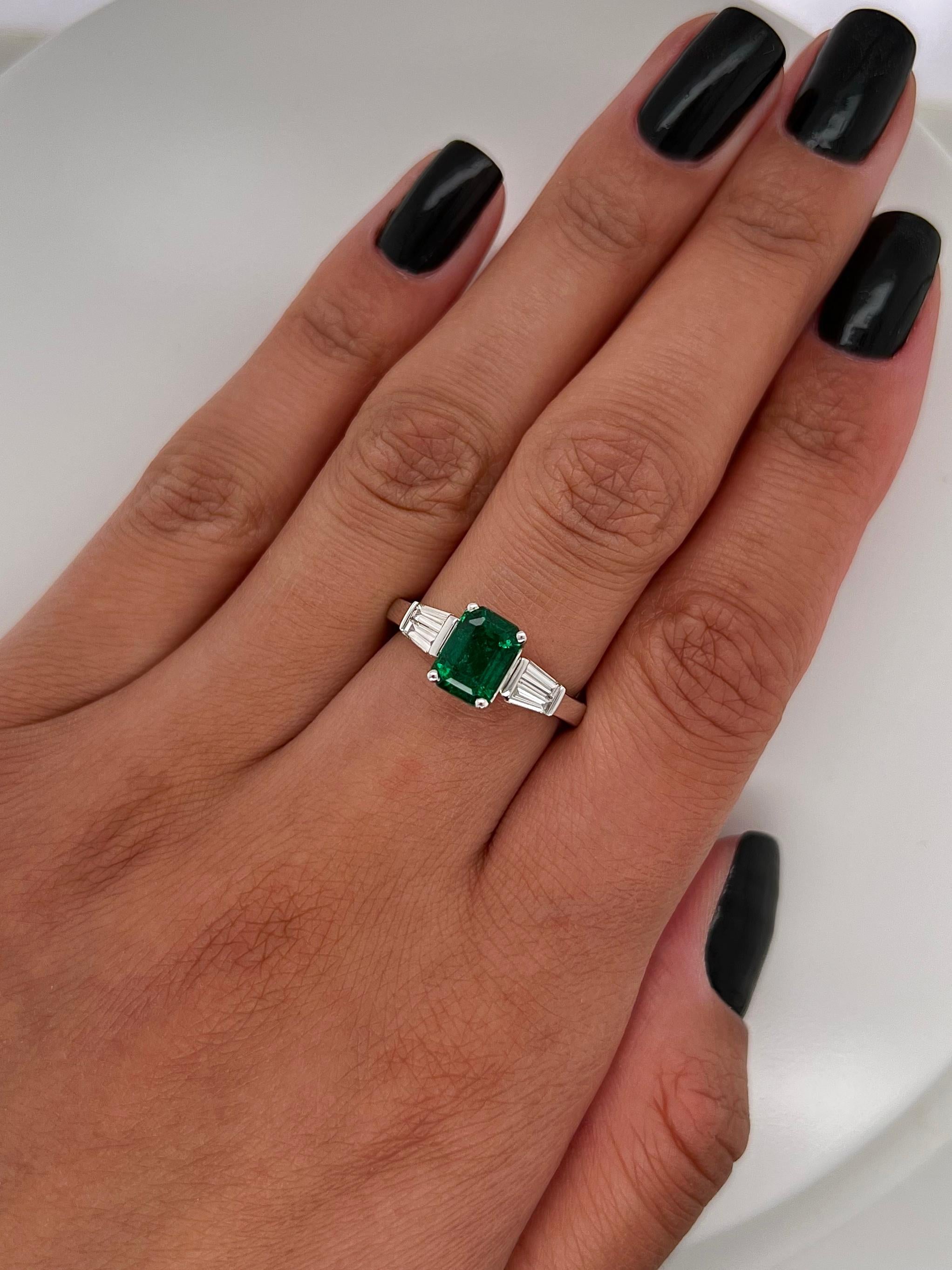 Emerald Cut 2.17 Total Carat Green Emerald and Diamond Ladies Three Stone Ring For Sale