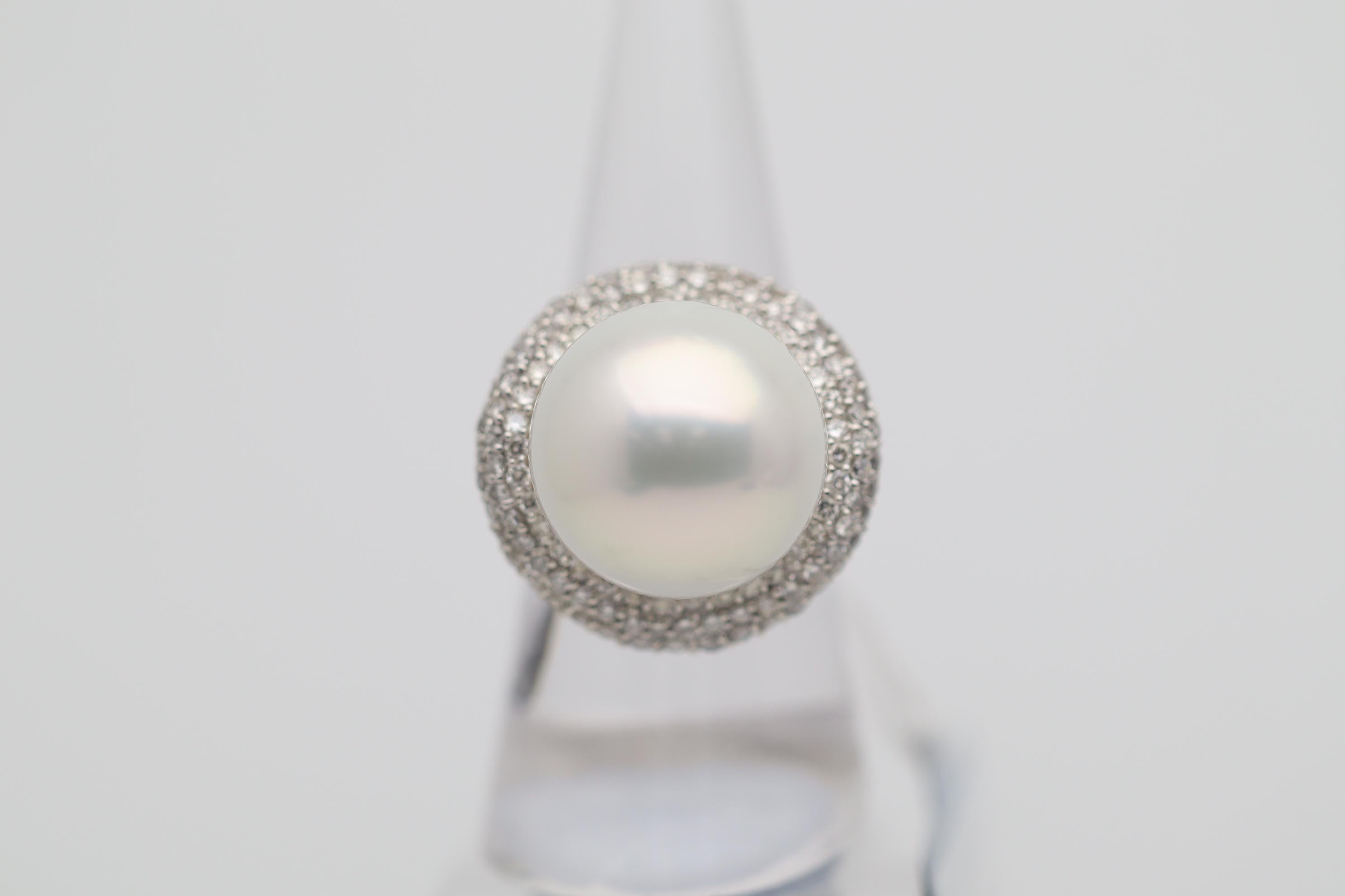 A superb South Sea cultured pearl measuring an astonishing 17.2 millimeters takes center stage! This is one of the largest pearls we have in our collection and its also one of our finest in terms of quality. It is perfectly rounded, has excellent