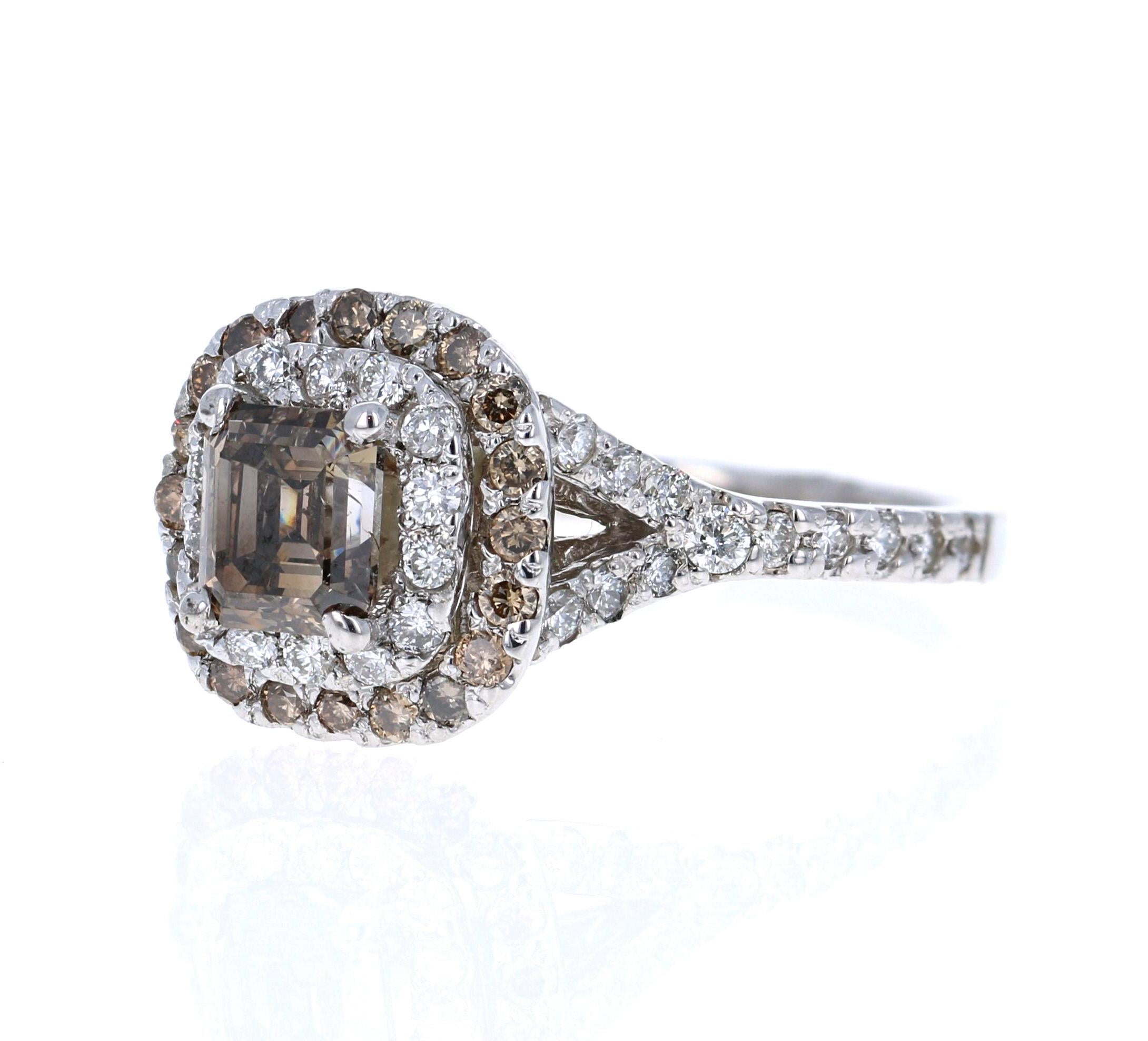 This beautiful engagement ring has a Emerald Cut Champagne Diamond that weighs 1.01 carats with a clarity of SI1. It has a halo of 38 Round Cut Diamonds that weigh 0.47 carats (SI-F) and another halo of 20 Champagne Round Cut Diamonds that weigh