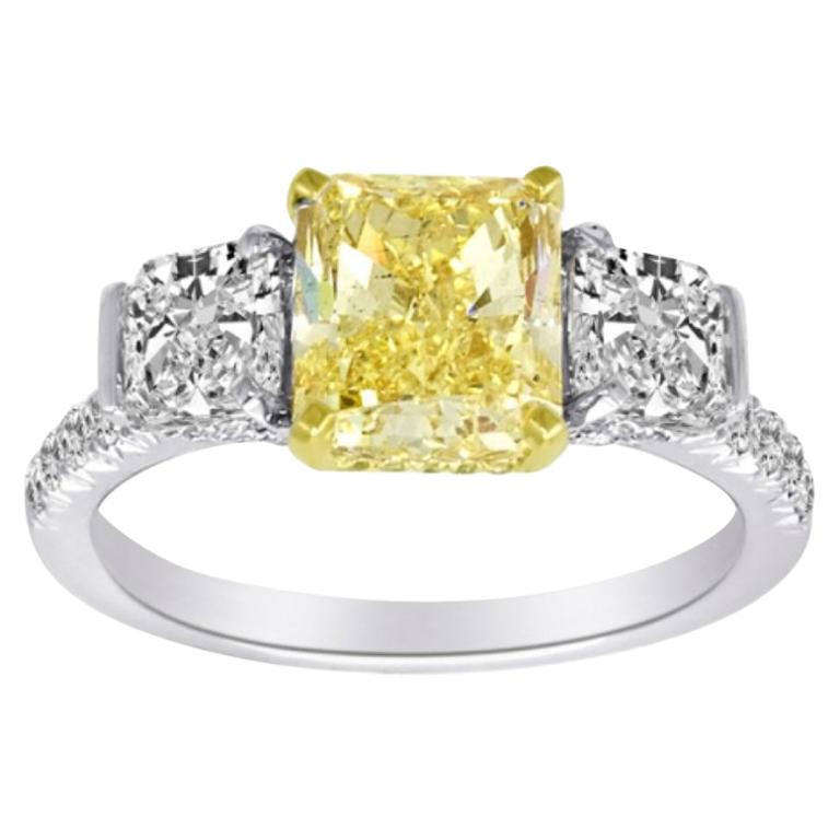 1.73 Carat Fancy Yellow Diamond Ring with GIA Certificate Set in 18 Karat Gold For Sale