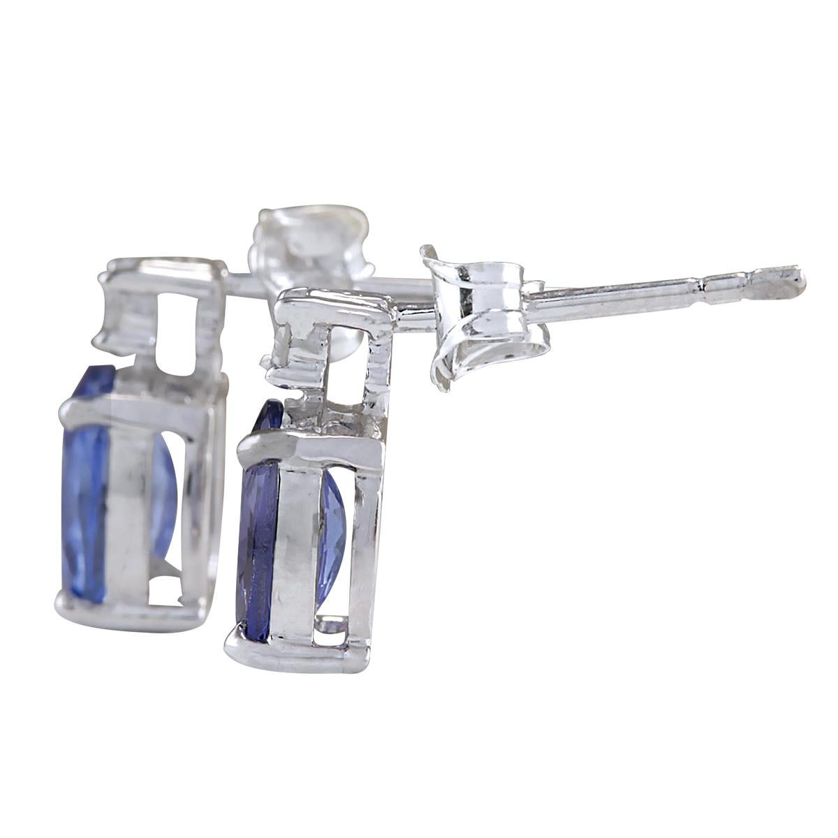 Stamped: 14K White Gold
Total Earrings Weight: 1.4 Grams
Total Natural Tanzanite Weight is 1.67 Carat (Measures: 7.00x5.00 mm)
Color: Blue
Total Natural Diamond Weight is 0.06 Carat
Color: F-G, Clarity: VS2-SI1
Face Measures: 9.95x5.10 mm
Sku: