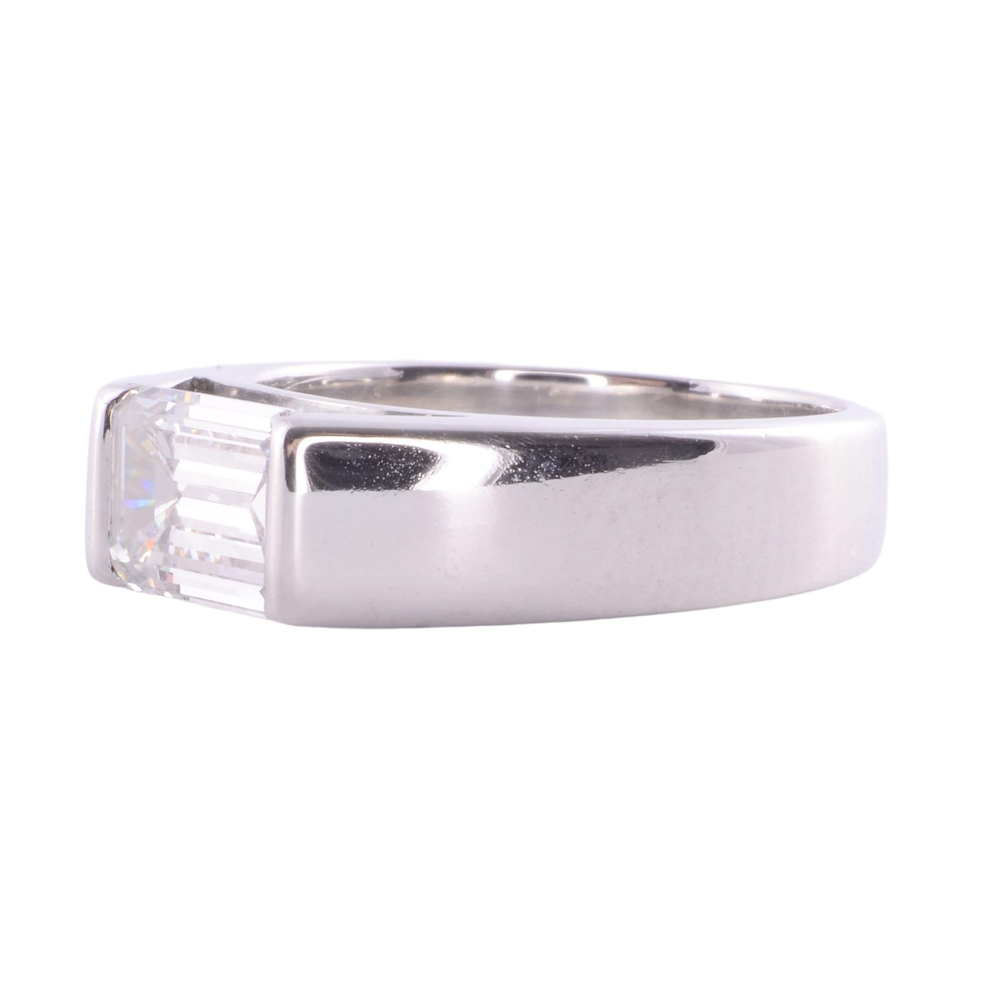Estate 1.73 carat VVS2 emerald cut diamond platinum ring, circa 1990. This heavy platinum solitaire ring features a 1.73 carat emerald cut diamond. The diamond boasts VVS2 clarity and F color. This exquisite solitaire diamond ring is appraised at