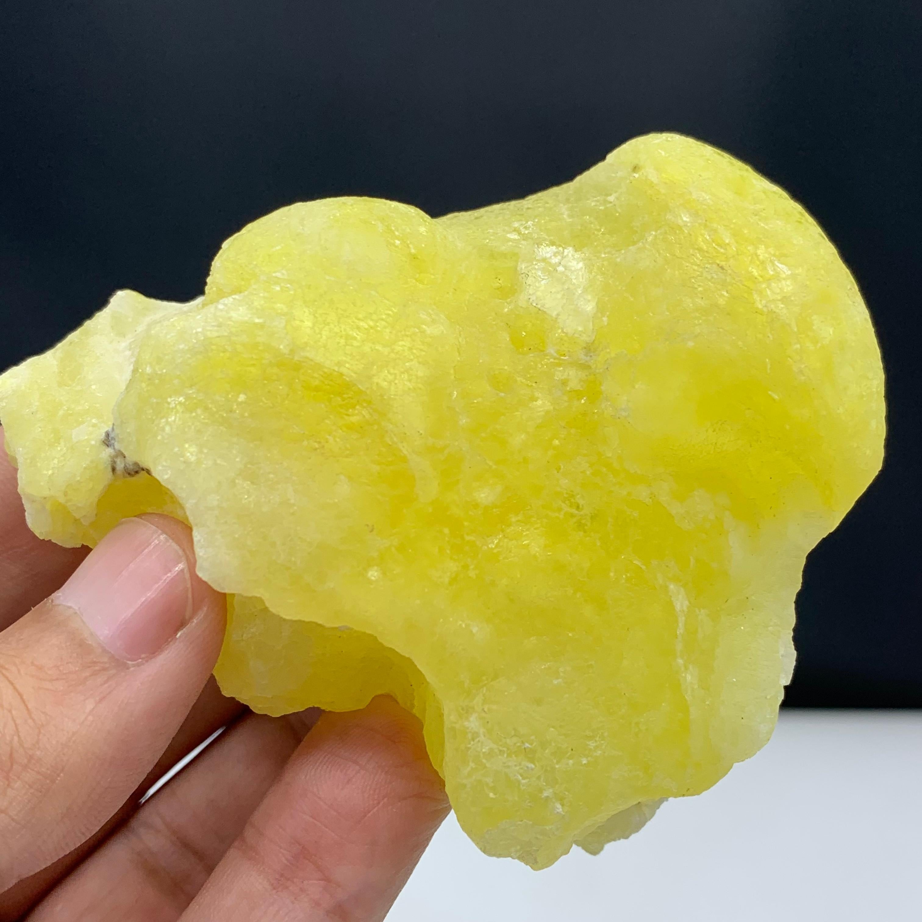 Adorable Lemon Yellow Brucite In Botryoidal Rounded Habit From Pakistan
Weight: 173 gram 
Dimension: 8.7 x 7 x 3.5 Cm 
Origin : Qilla Saifullah khan District, Balochistan, Pakistan 

It is used to allieviate pain, including headaches, migraines and