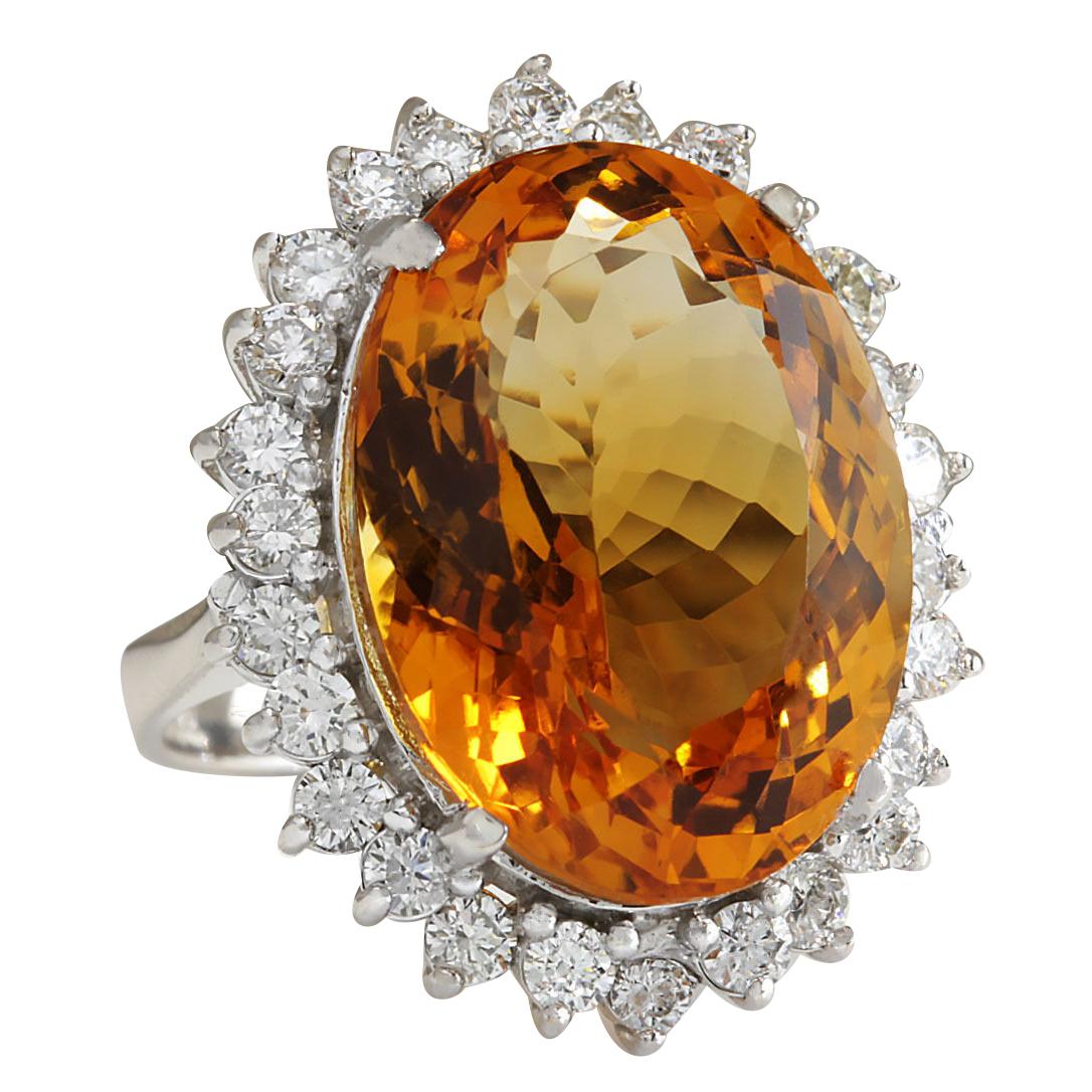 Elevate your style with this stunning 17.30 Carat Natural Citrine 14 Karat White Gold Diamond Ring. Crafted from luxurious 14K White Gold, this exquisite ring weighs 6.8 grams, ensuring both elegance and durability. The centerpiece of this ring is a