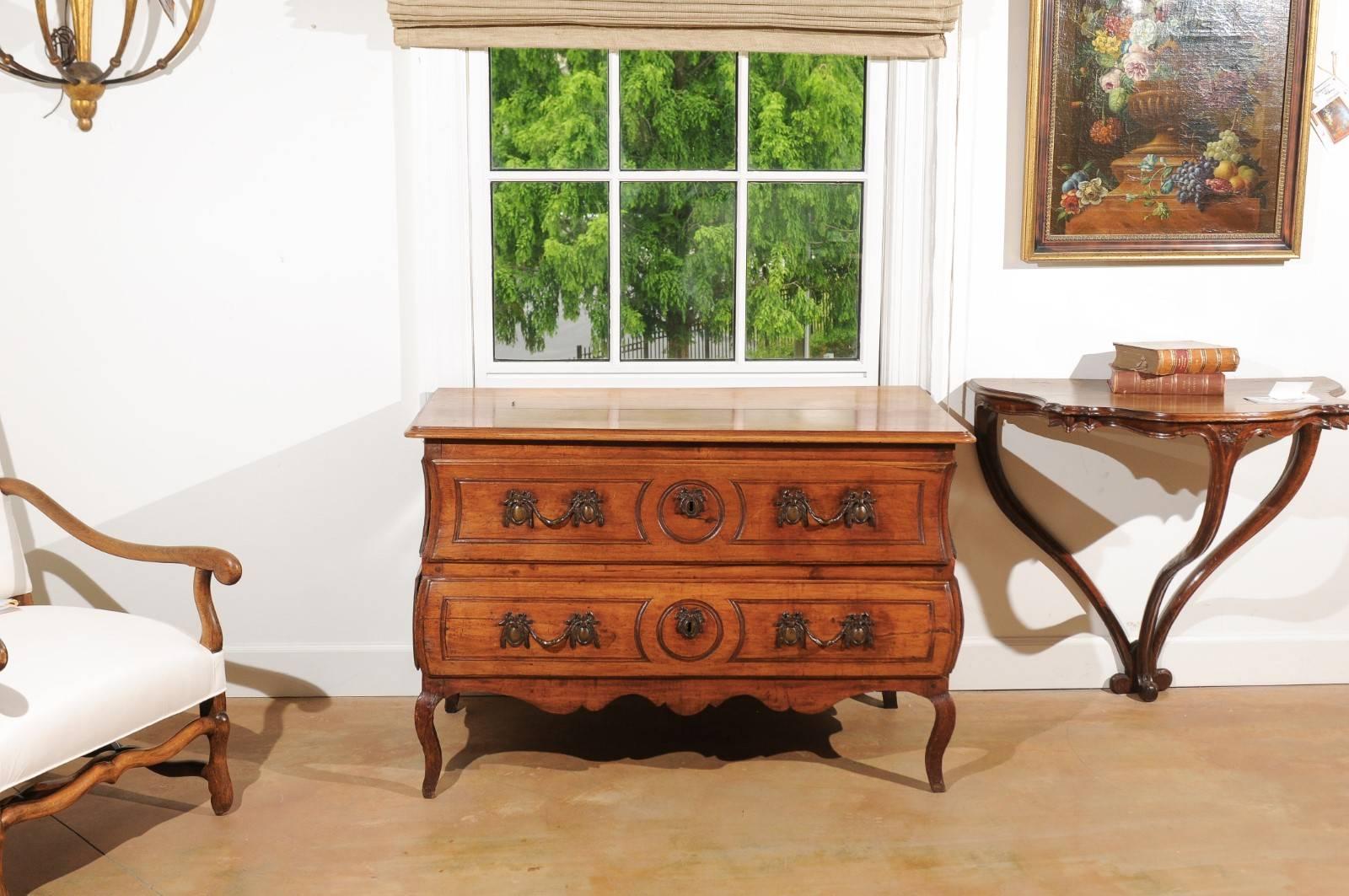 Carved 1730s French Period Louis XV Walnut Two-Drawer Commode with Bombé Side Panels For Sale