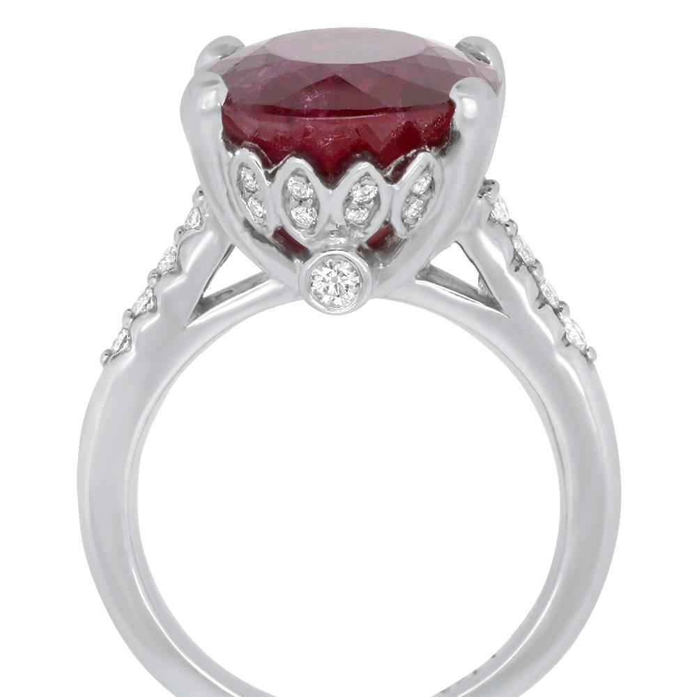 Material: 14k White Gold 
Center Stone Details: 1 Oval Rubelite at 17.36 Carats. Measuring 14.7 x 12.4 mm.
Mounting Diamond Details: 42 Diamonds at 0.40 Carats. Clarity: SI / Color: H-I
Ring Size: Size 6.5. Alberto offers complimentary sizing on all