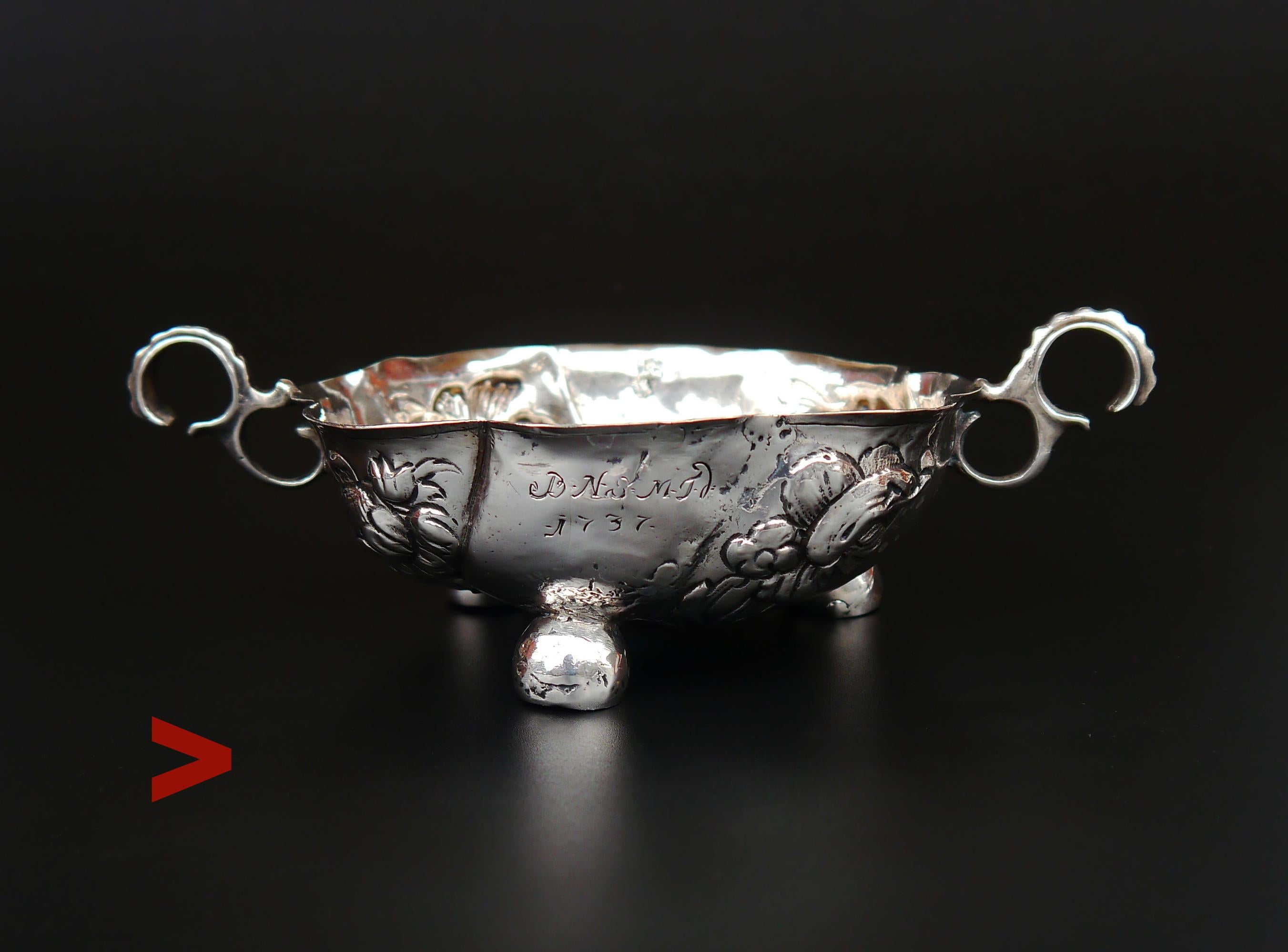 Handsome old Danish solid Silver bowl on hollow round feet and twisted handles decorated with floral ornaments. 

This piece has Danish 18th century hallmarks on the  indicate that this piece was made in Copenhagen of solid 925 Silver. Worn maker's